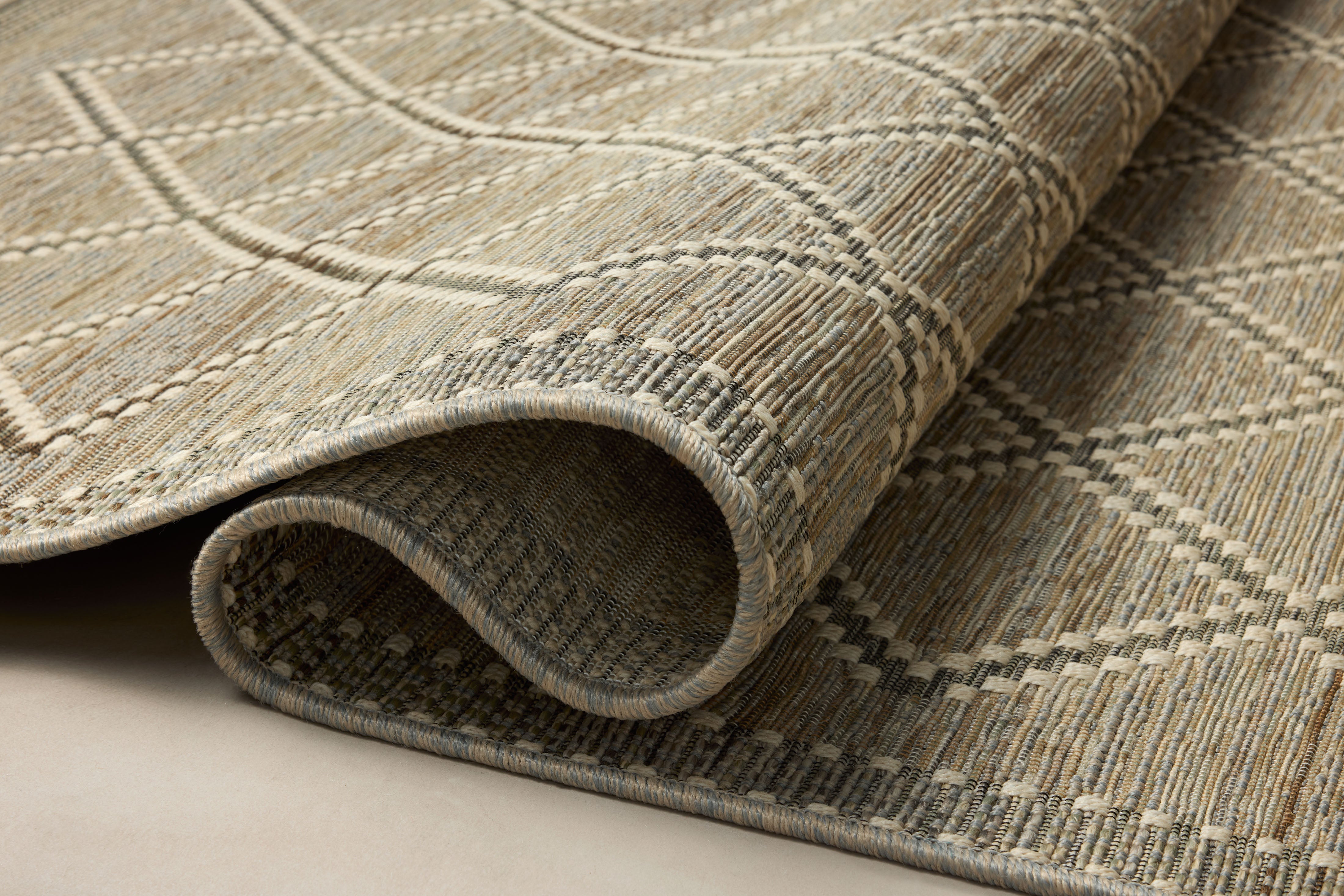 The Saylor SAY-04 Stone / Ivory Area Rug combines grounding stone and refined ivory tones with a power-loomed polypropylene area rug for effortless elegance
