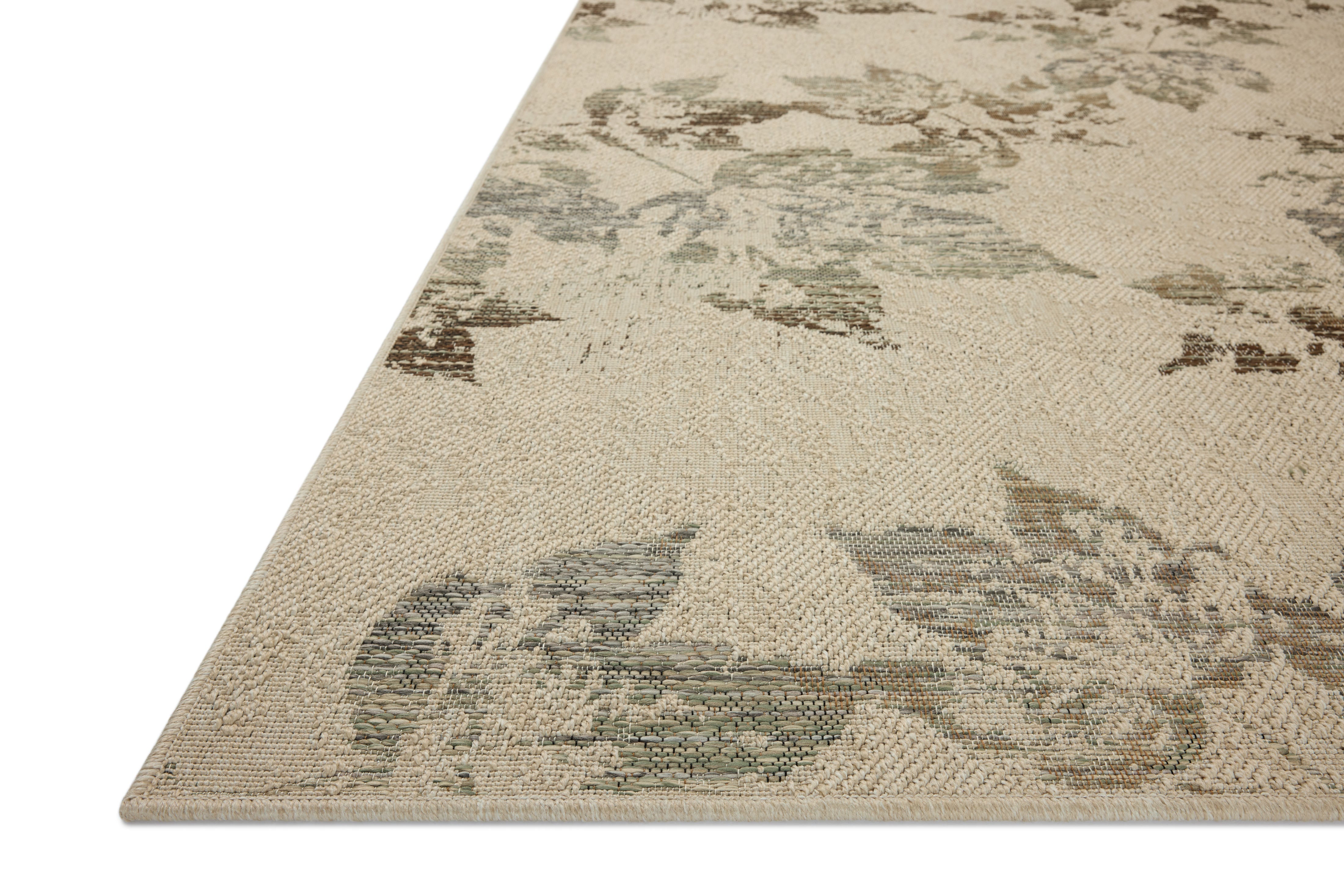 Rich in refined ivory and grounded bark hues, the Saylor SAY-06 Ivory / Bark Area Rug is a power-loomed polypropylene area rug built for style and comfort
