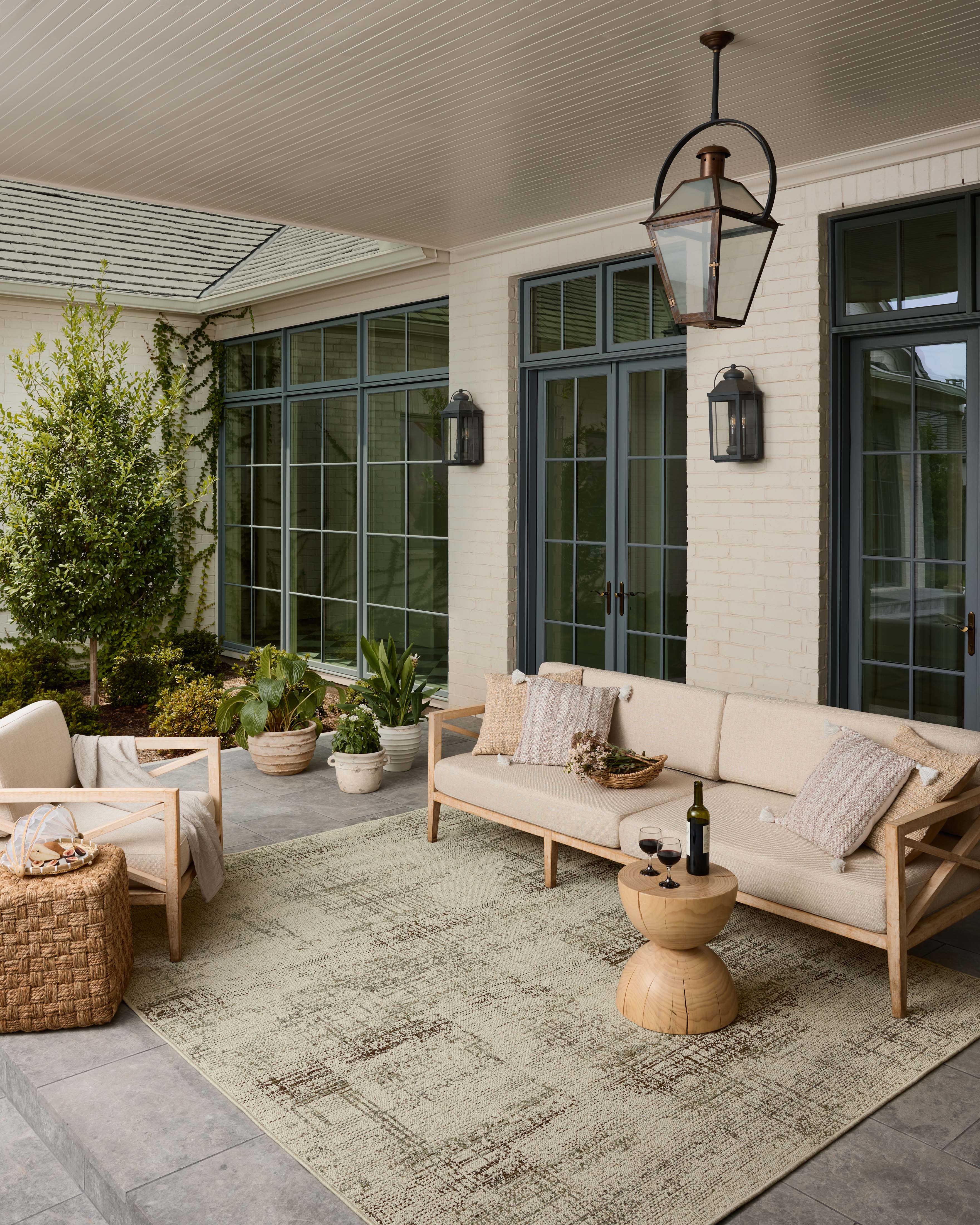The Saylor SAY-07 Ivory / Fog Area Rug offers refined ivory and misty sophistication in a power-loomed polypropylene area rug