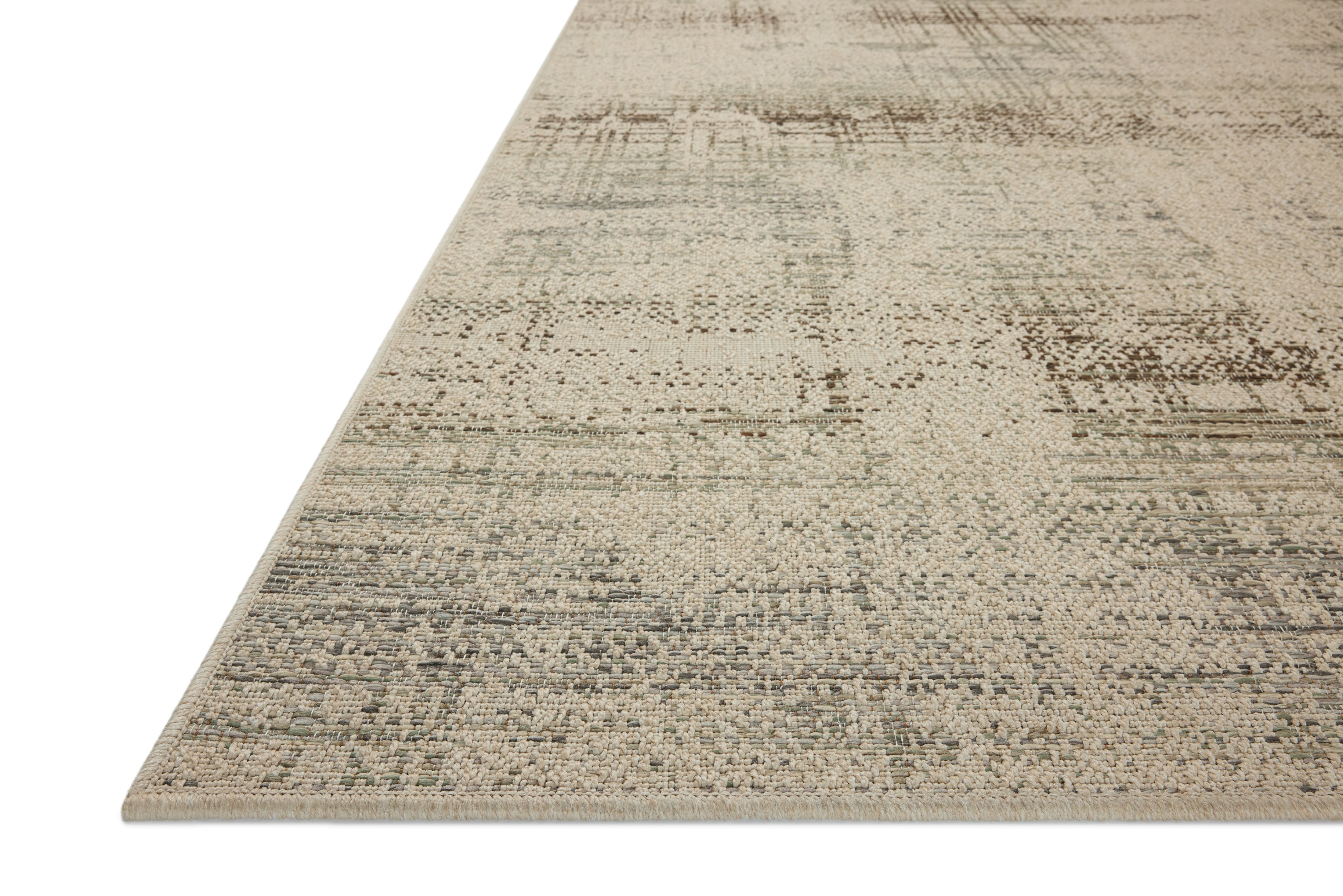 The Saylor SAY-07 Ivory / Fog Area Rug offers refined ivory and misty sophistication in a power-loomed polypropylene area rug