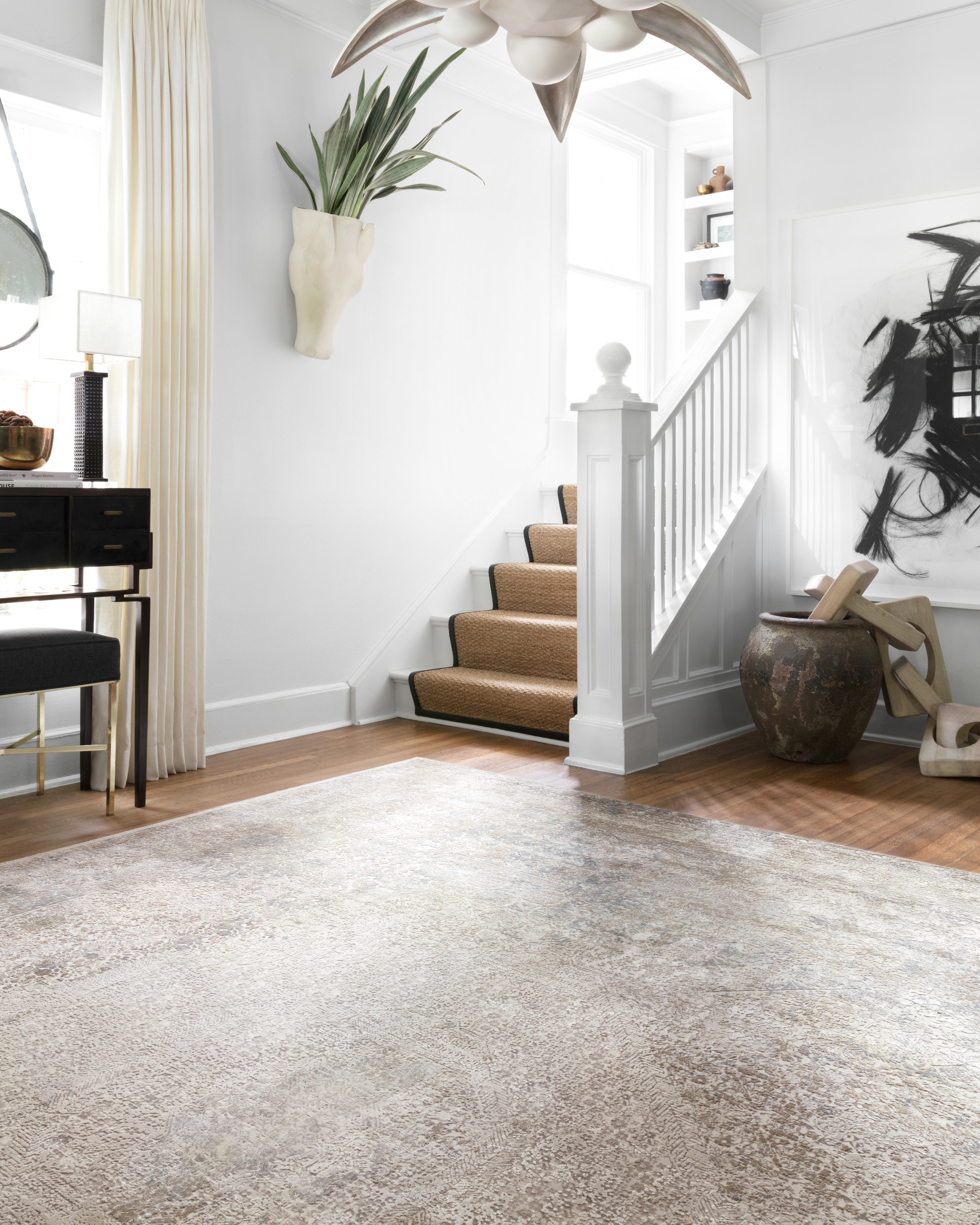 Sienne SIE-01 Ivory/Pebble area rug with subtle distressed motif, neutral palette, silky sheen