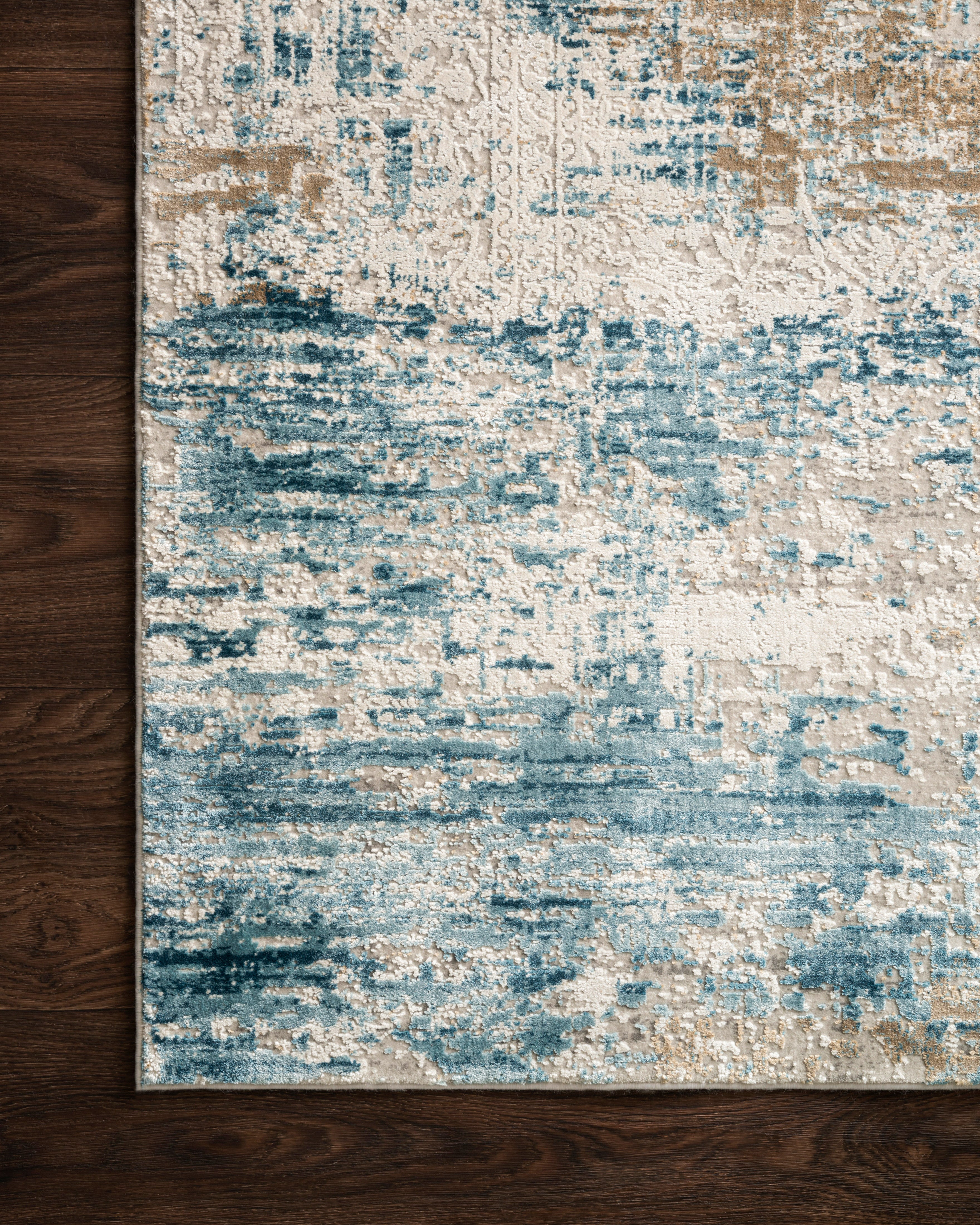 Sienne SIE-05 Ivory/Azure area rug with subtle distressed pattern, ivory base with azure, blue tones
