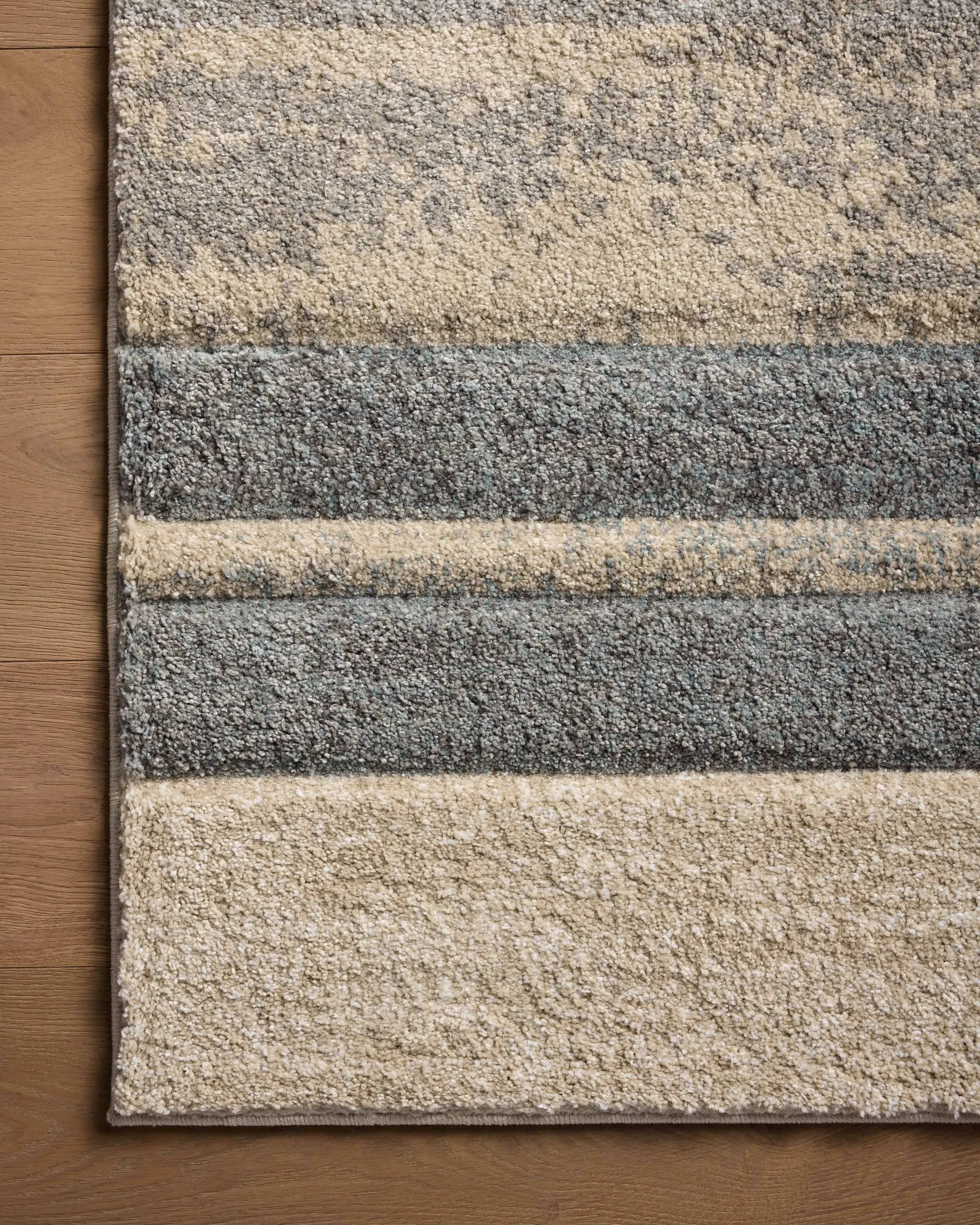 SILAS SLA-07 Slate/Sand geometric area rug with slate gray and sand tones, faded pattern