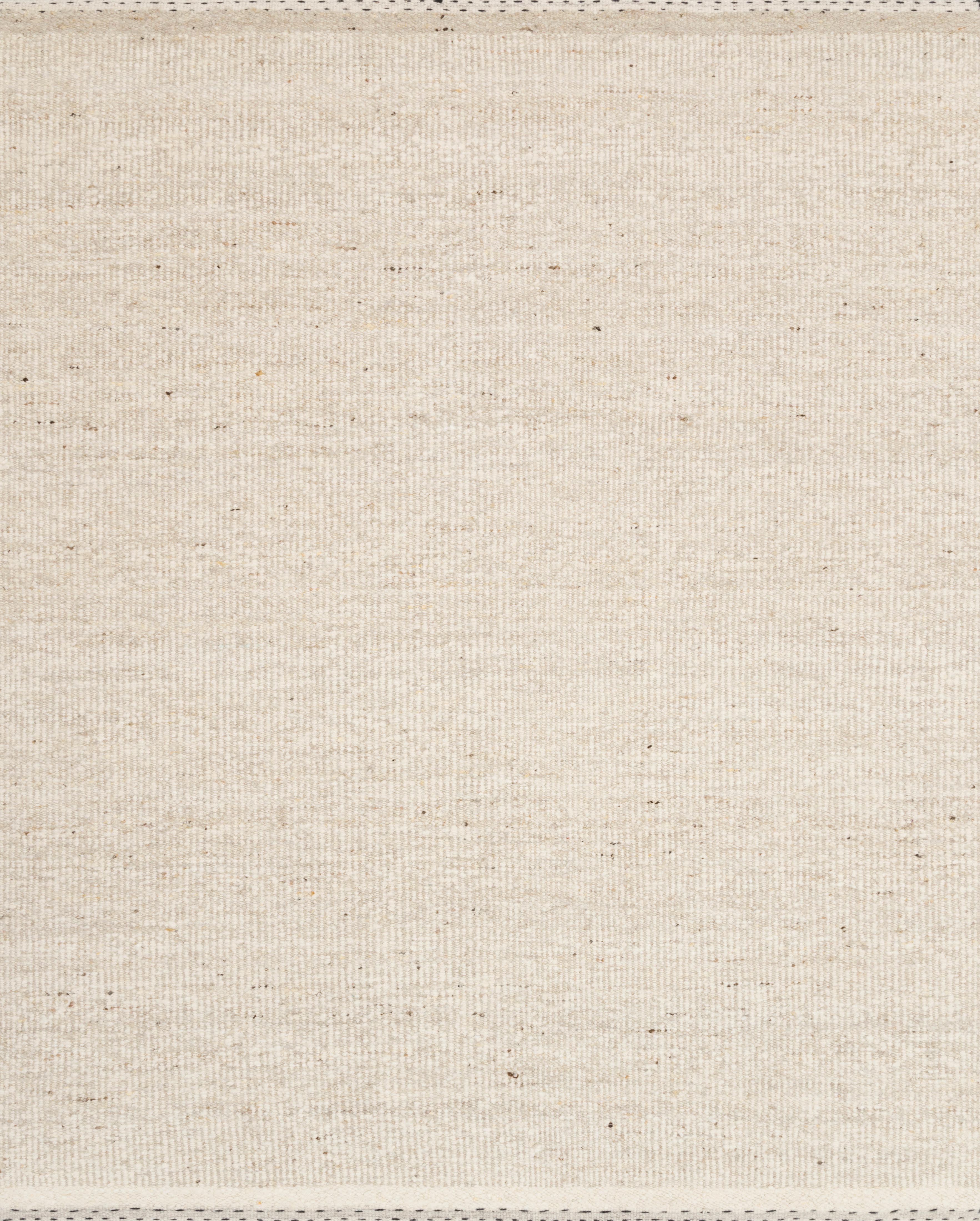 A hand-woven wool, cotton, and polyester area rug with bohemian and contemporary flair in cozy oatmeal tones, the Sloane SLN-01 Oatmeal Area Rug anchors any room