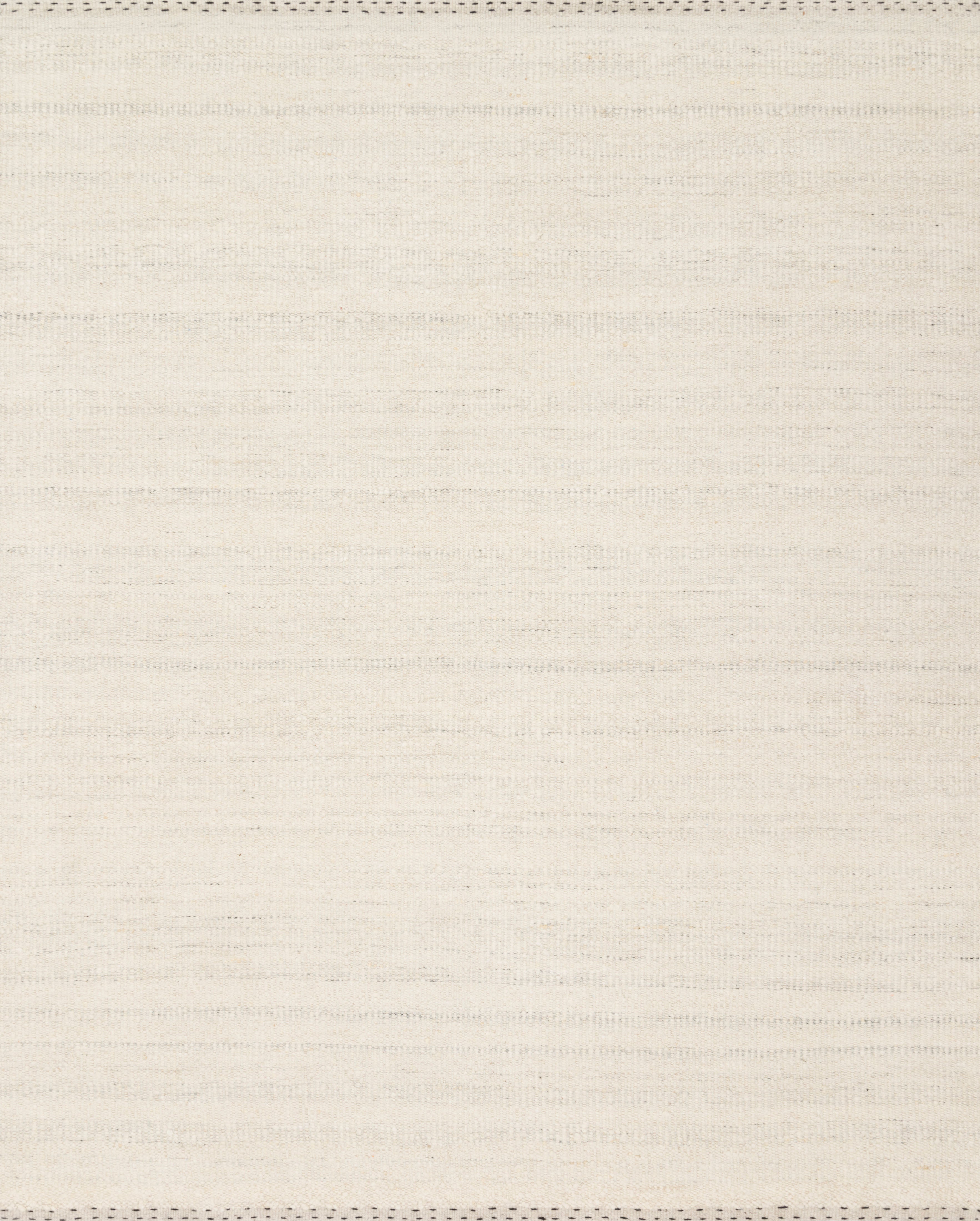 The Sloane SLN-01 Sky Area Rug pairs breezy sky-blue tones and bohemian and contemporary patterns in a hand-woven wool, cotton, and polyester area rug