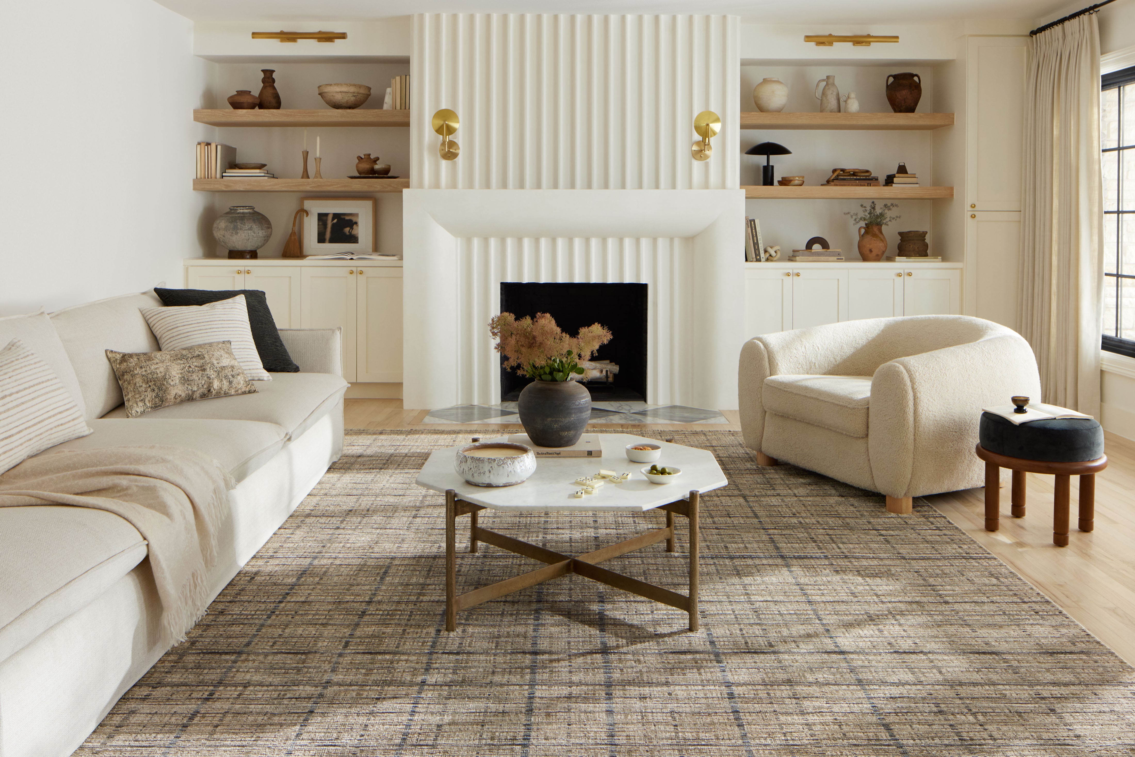 Designed with contemporary and abstract artistry in subtle pebble and deep charcoal hues, the Soho SOH-04 Pebble / Charcoal Area Rug is a power-loomed 100% polyester area rug that stands out