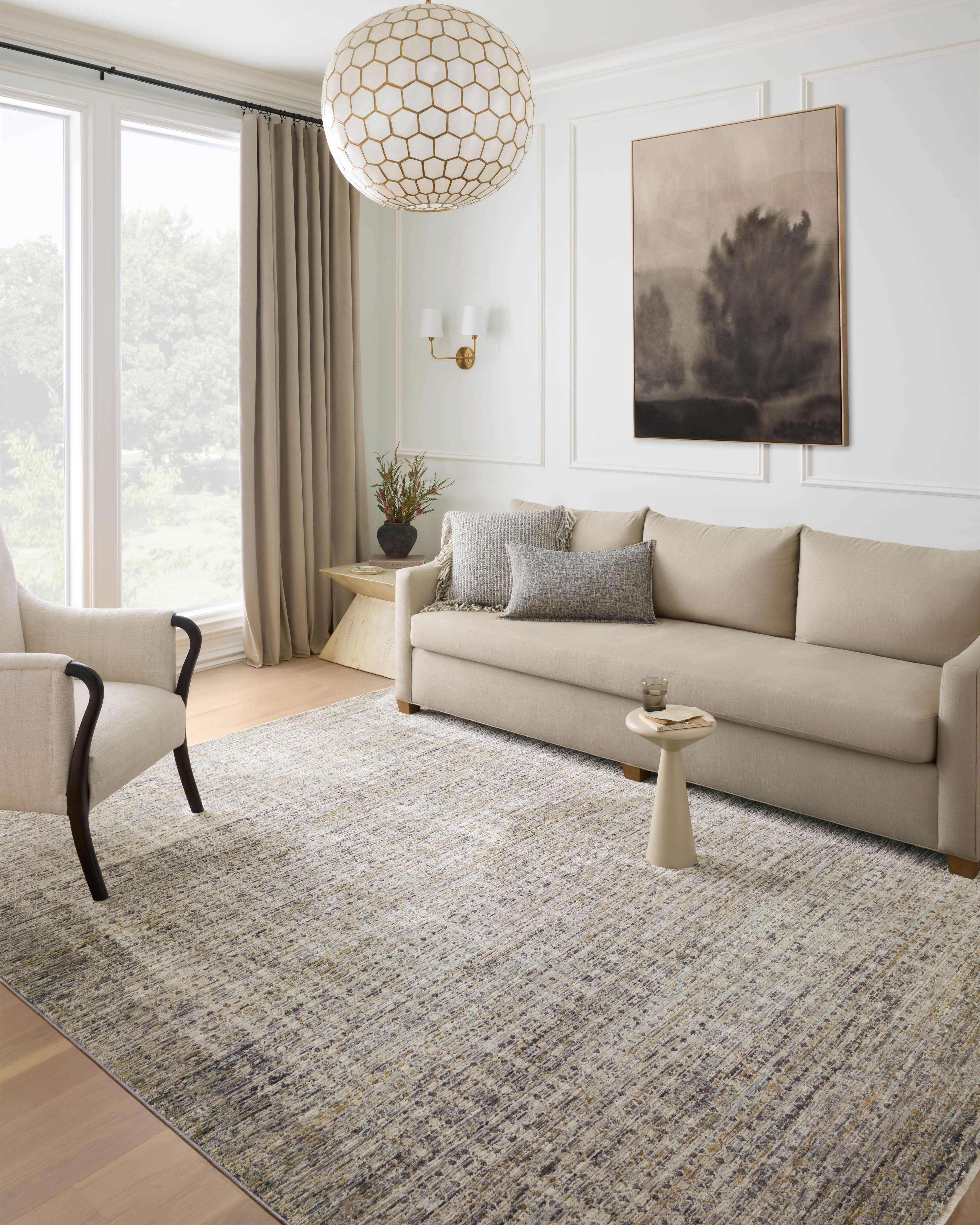 The Soho SOH-05 Charcoal / Multi Area Rug combines deep charcoal and vibrant multi-toned tones and contemporary and abstract patterns in a power-loomed 100% polyester area rug for effortless elegance