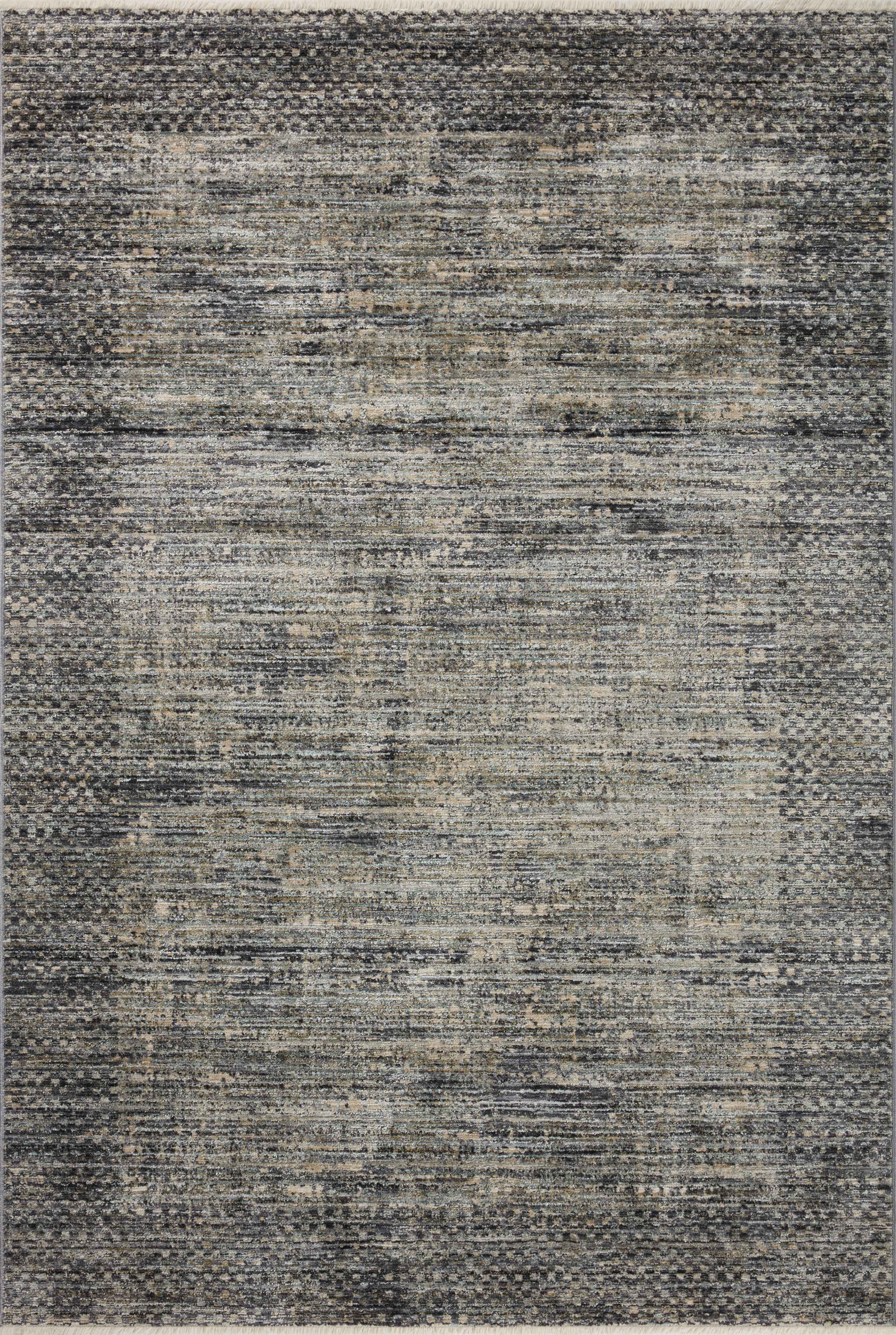 A power-loomed 100% polyester area rug featuring contemporary and abstract design and vibrant multi-toned and cool slate tones, the Soho SOH-06 Multi / Slate Area Rug adds character to any room