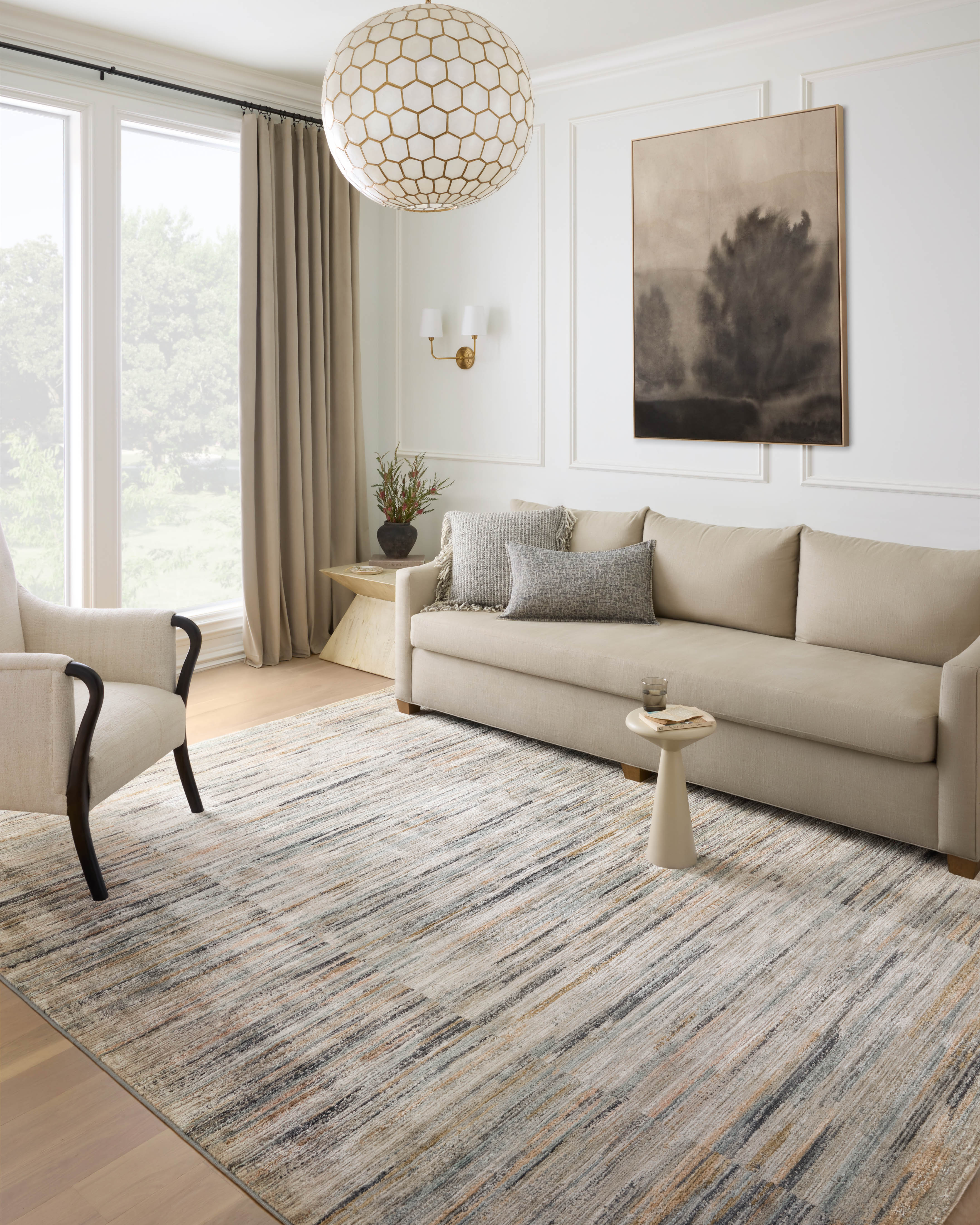 Rich in vibrant multi-toned and gentle dove hues with contemporary and abstract detail, the Soho SOH-07 Multi / Dove Area Rug is a power-loomed 100% polyester area rug built for style and comfort
