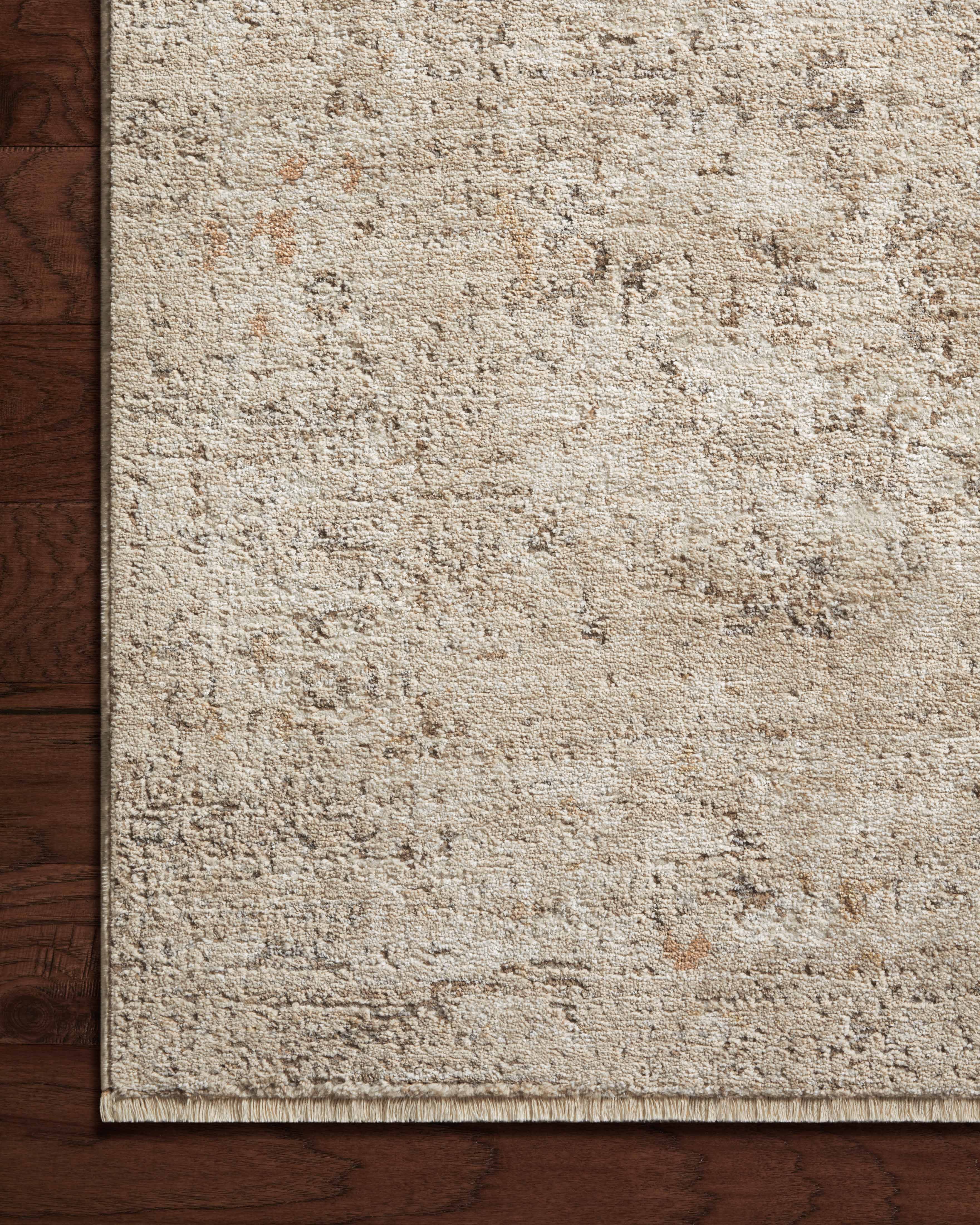 Expertly crafted as a power-loomed polypropylene and polyester area rug with traditional artistry, the Sonnet SNN-01 Sand / Taupe Area Rug captures sandy and versatile taupe tones beautifully