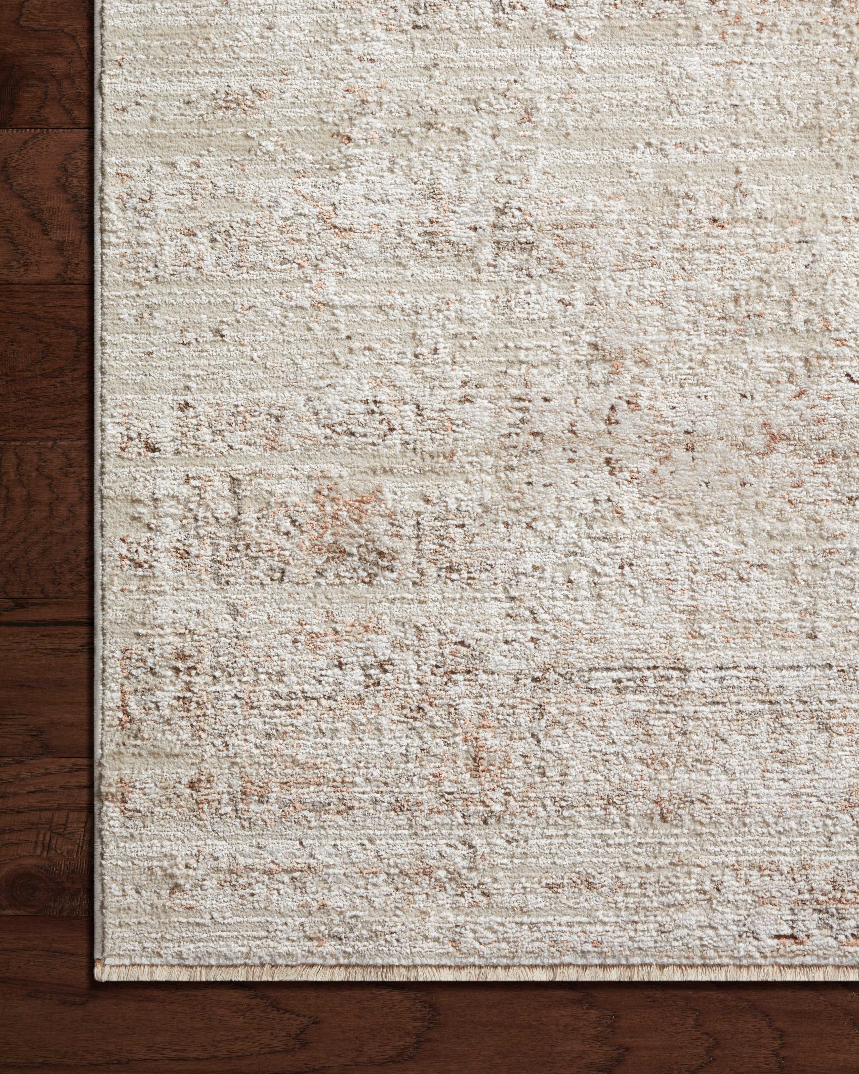 Finished in warm beige and rich terracotta tones with traditional styling, the Sonnet SNN-03 Beige / Terracotta Area Rug is a power-loomed polypropylene and polyester area rug for modern living
