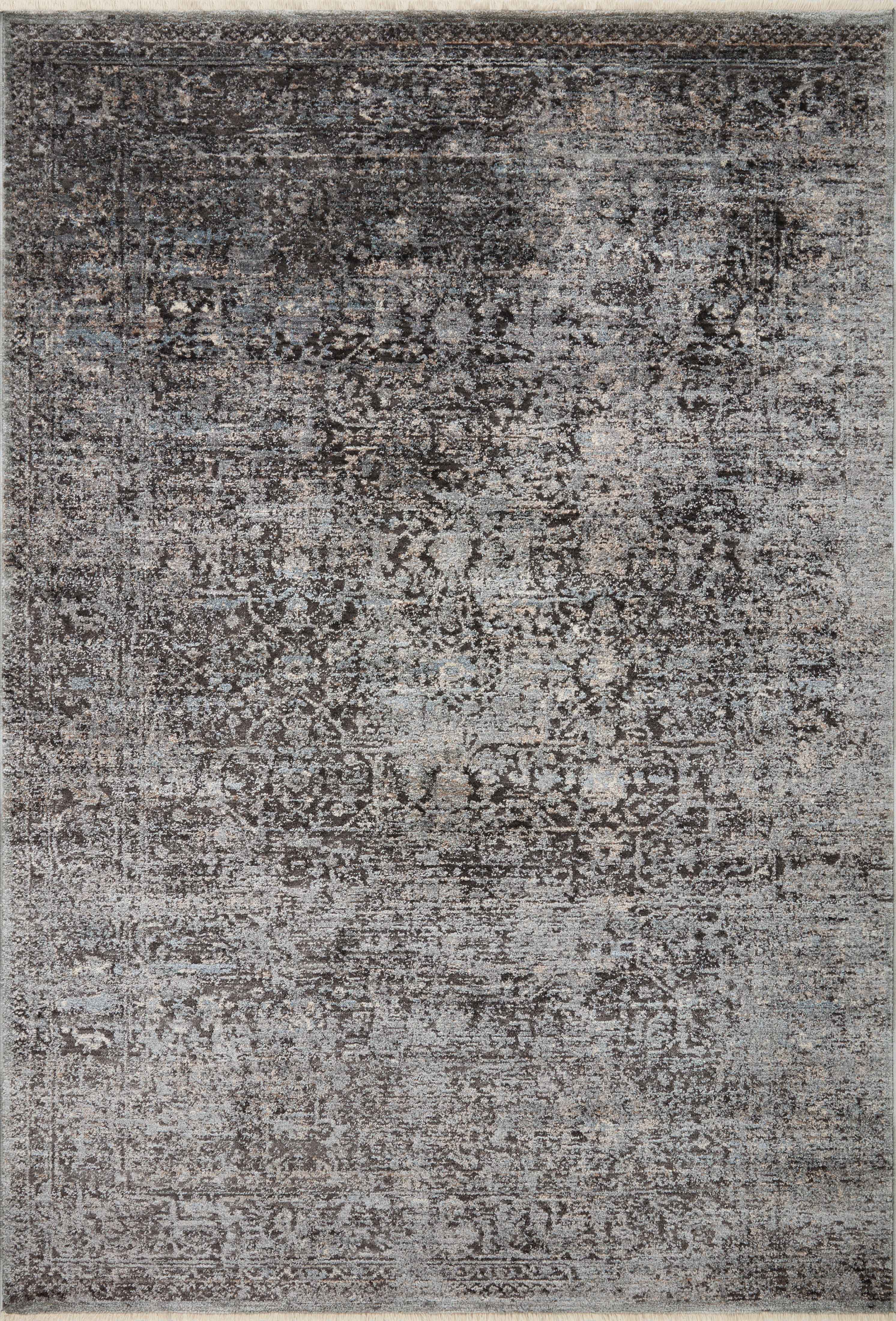 The Sonnet SNN-07 Charcoal / Mist Area Rug is a power-loomed polypropylene and polyester area rug that radiates deep charcoal and soft misty charm and traditional elegance