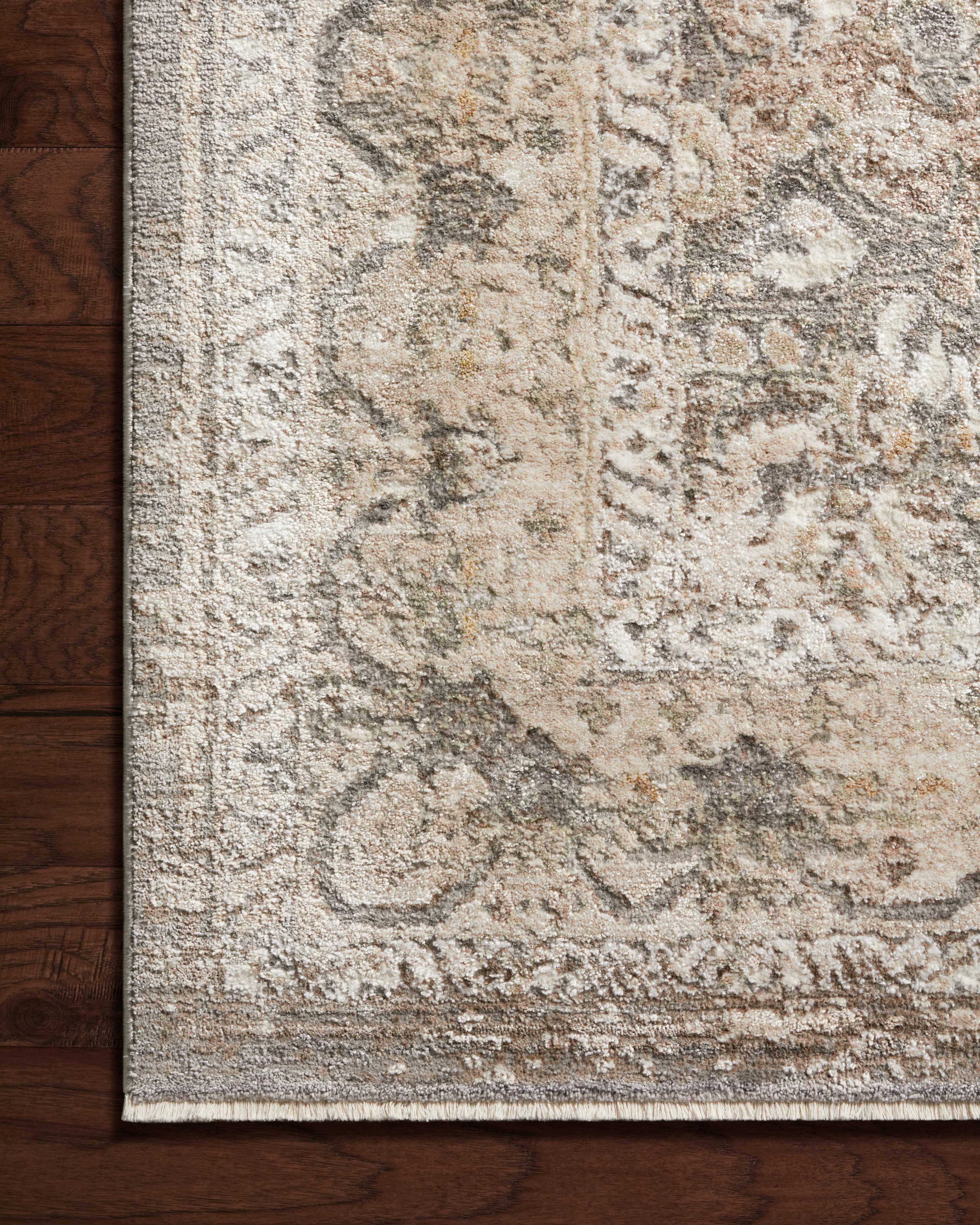 Layered in elegant grey and calming sage hues with traditional patterns, the Sonnet SNN-08 Grey / Sage Area Rug is a power-loomed polypropylene and polyester area rug perfect for any setting