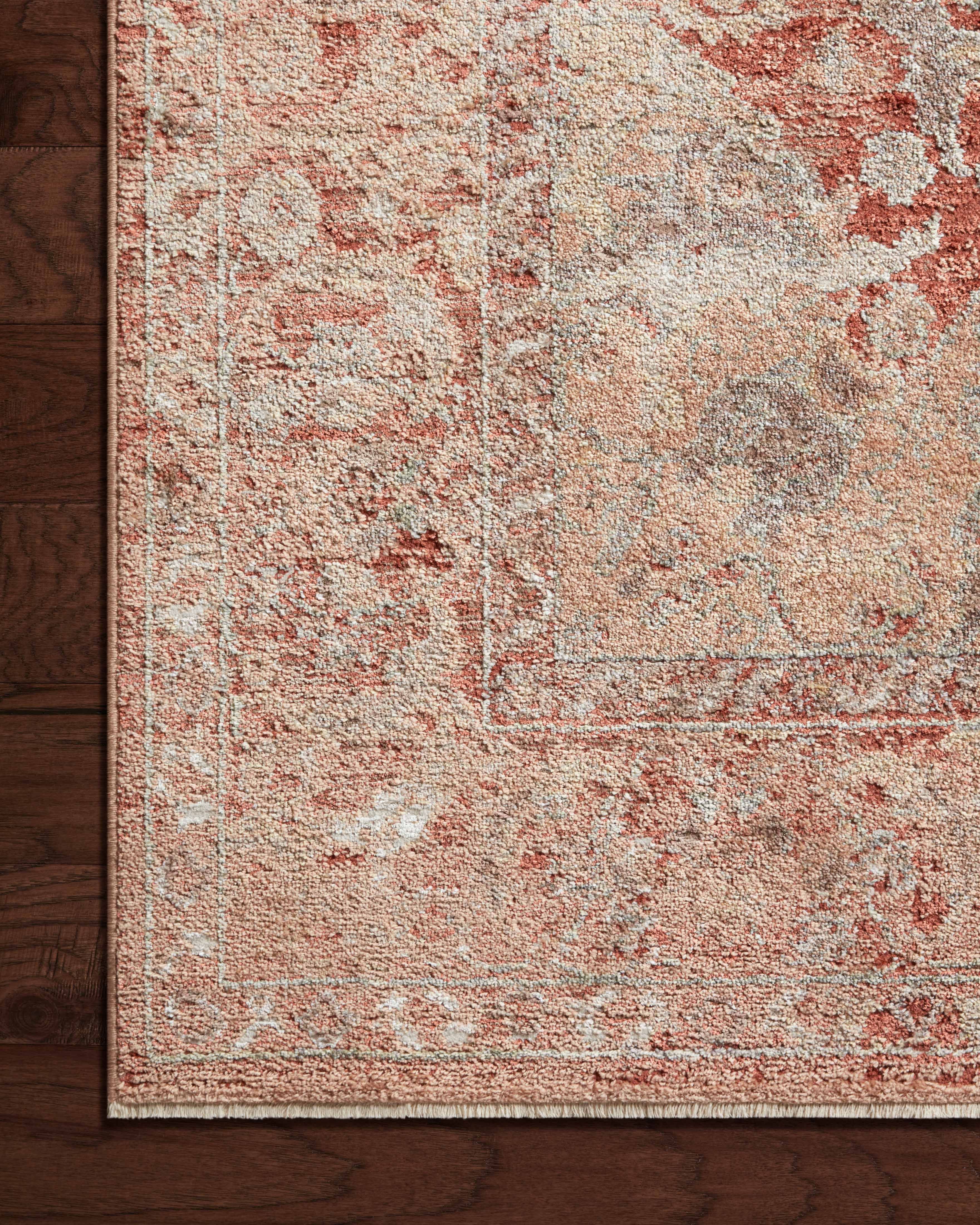 Featuring spirited spice and vibrant multi-toned hues and traditional detail, the Sonnet SNN-10 Spice / Multi Area Rug is a power-loomed polypropylene and polyester area rug for any room
