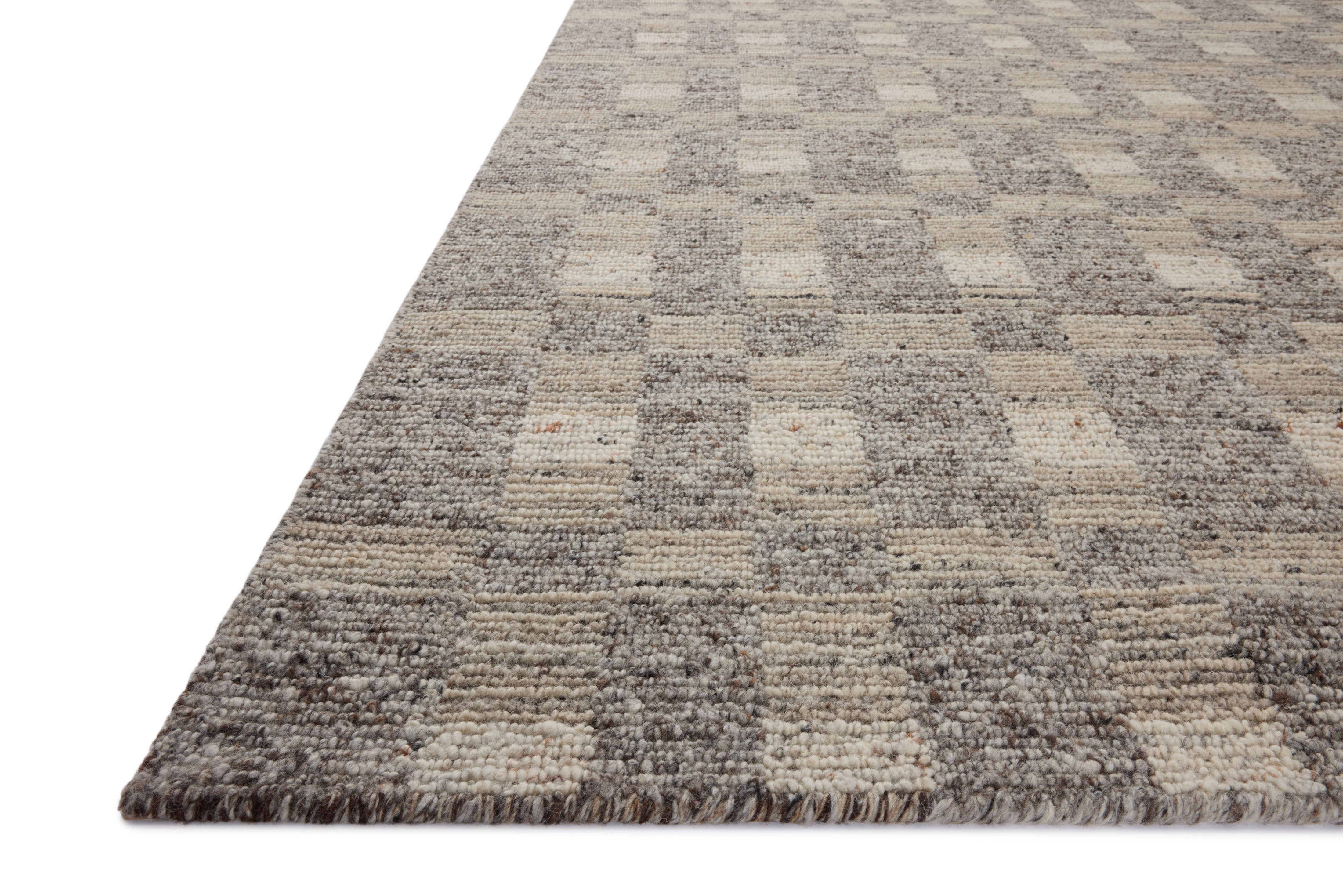 The Sonya SOY-04 Stone / Natural Area Rug highlights grounding stone and warm natural tones and graphic texture in a beautifully made hand-loomed wool area rug