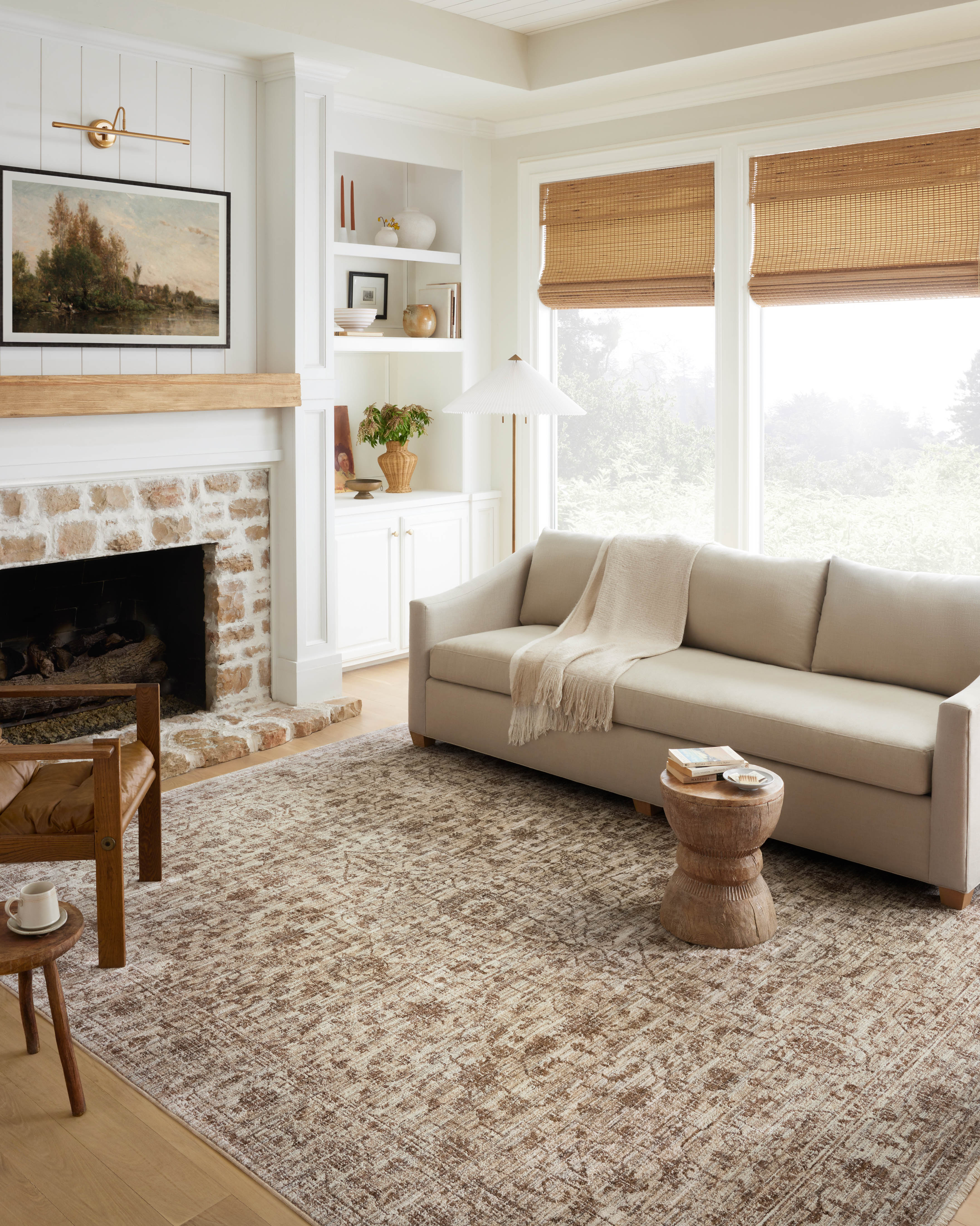 A power-loomed 100% polyester area rug with vintage flair in grounded bark and warm natural tones, the Sorrento SOR-01 Bark / Natural Area Rug anchors any room