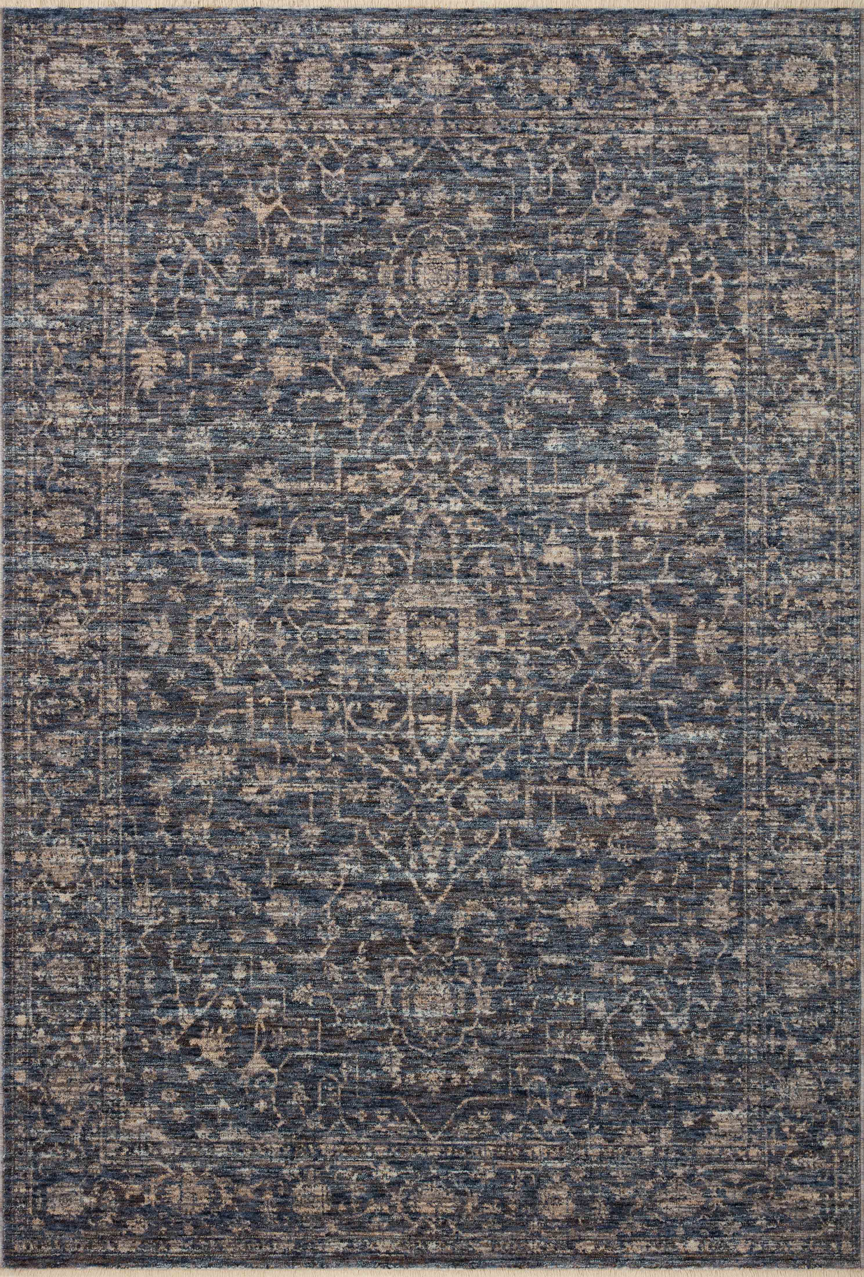 The Sorrento SOR-01 Midnight / Natural Area Rug pairs dramatic midnight and warm natural tones and vintage patterns in a power-loomed 100% polyester area rug