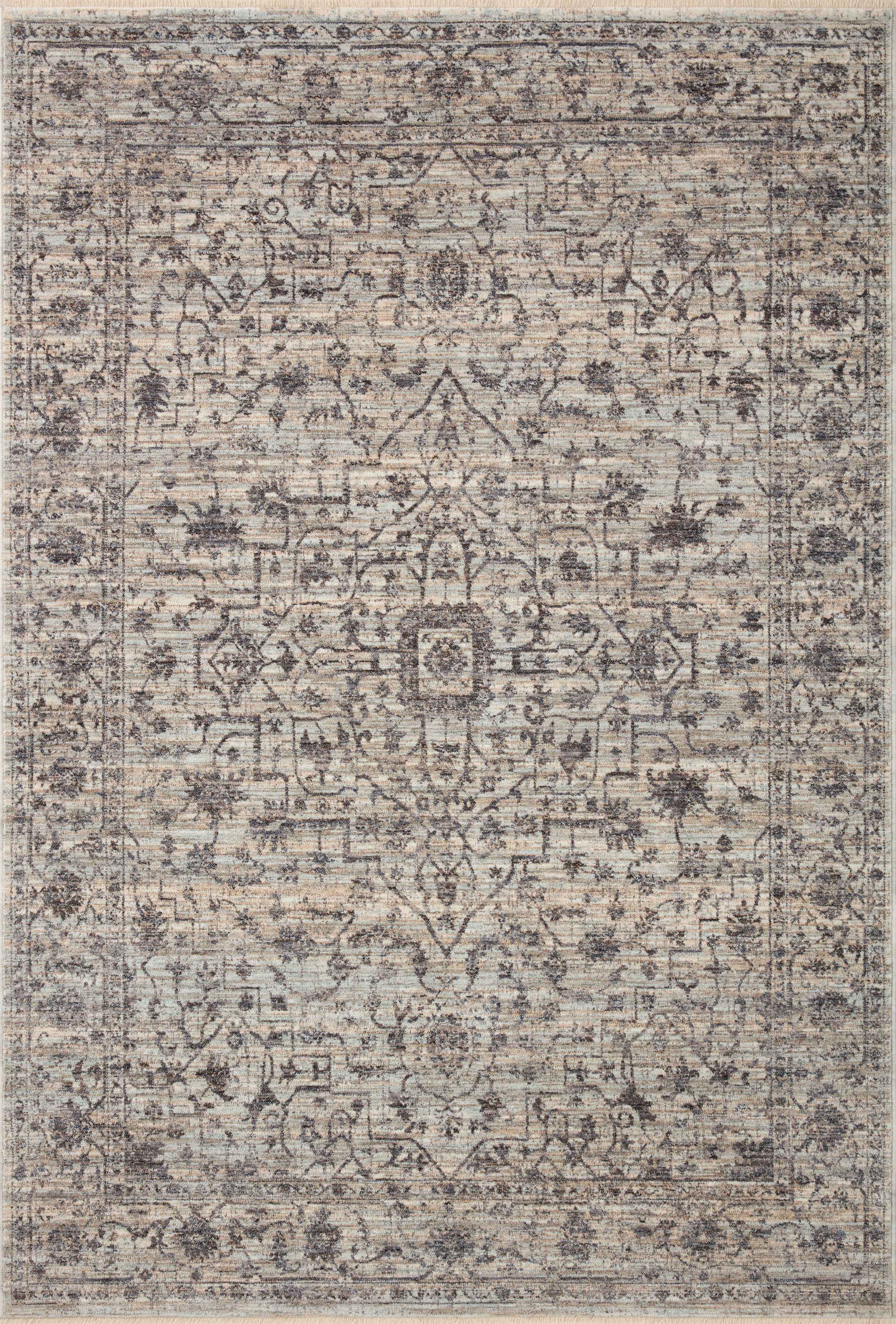 Crafted as a power-loomed 100% polyester area rug, the Sorrento SOR-01 Mist / Charcoal Area Rug brings soft misty and deep charcoal warmth and vintage character to your space