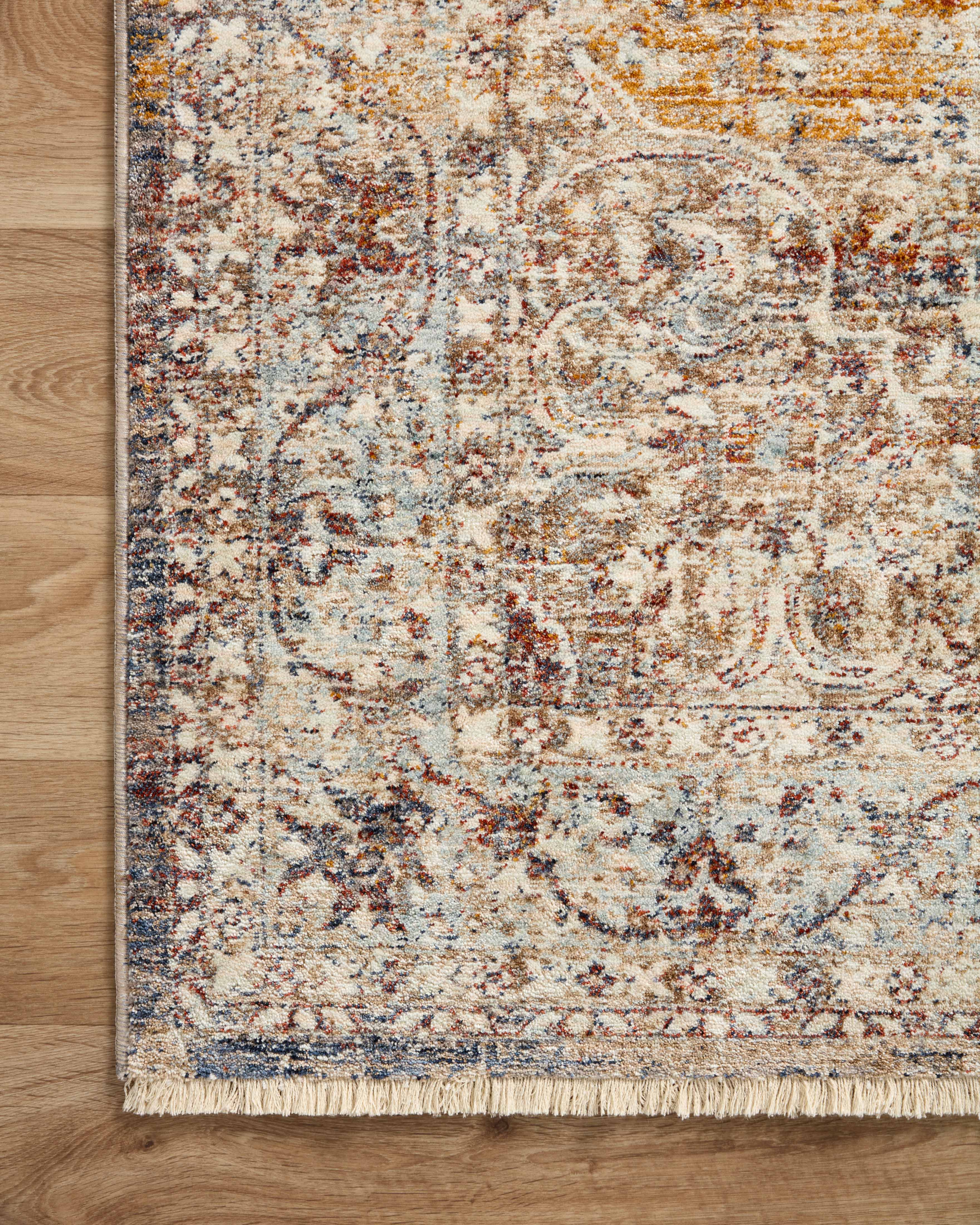 A stunning power-loomed 100% polyester area rug with vintage detail, the Sorrento SOR-04 Natural / Multi Area Rug features warm natural and vibrant multi-toned tones for a polished look