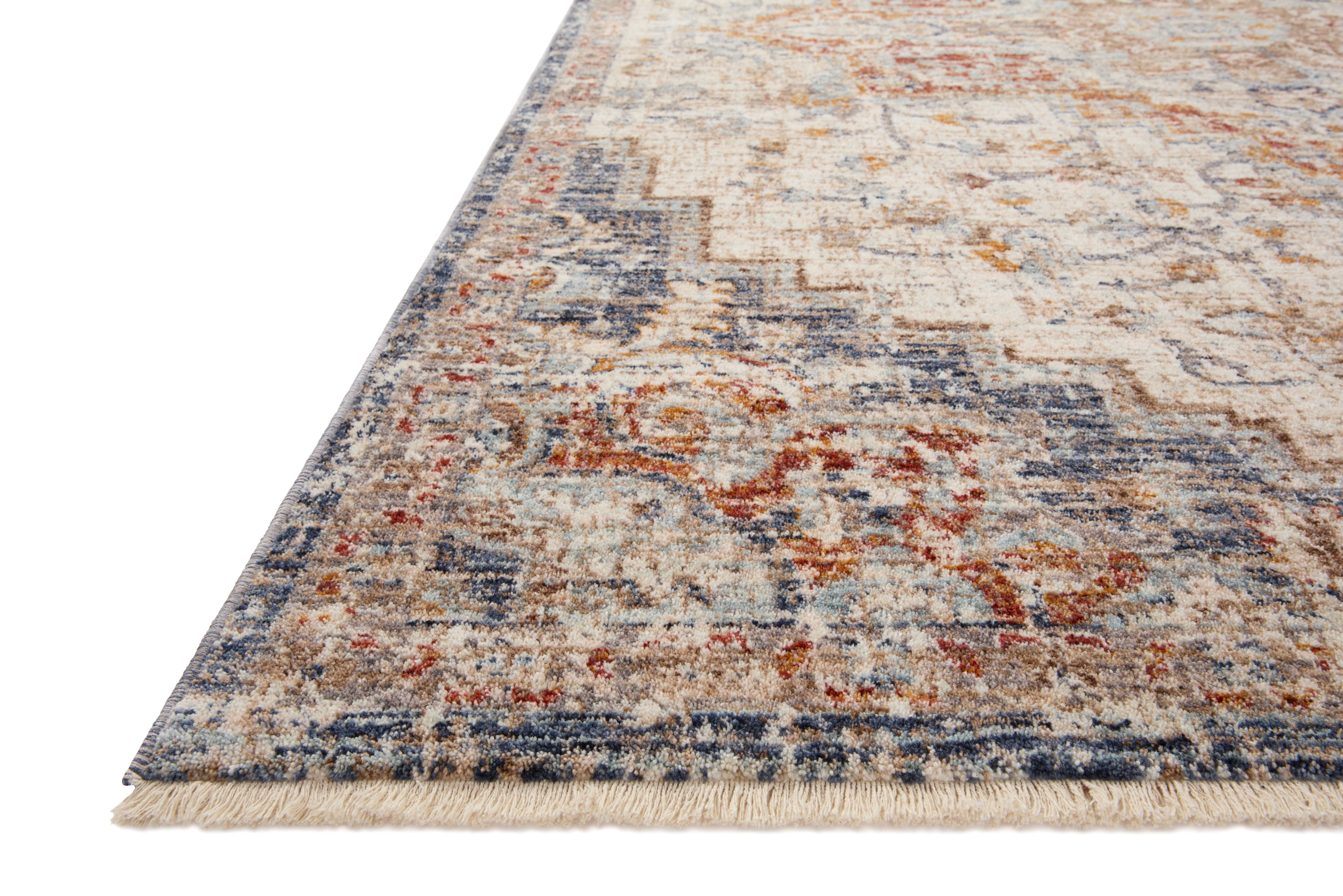 The Sorrento SOR-05 Ivory / Fiesta Area Rug delivers refined ivory and lively fiesta beauty and vintage elegance in a power-loomed 100% polyester area rug