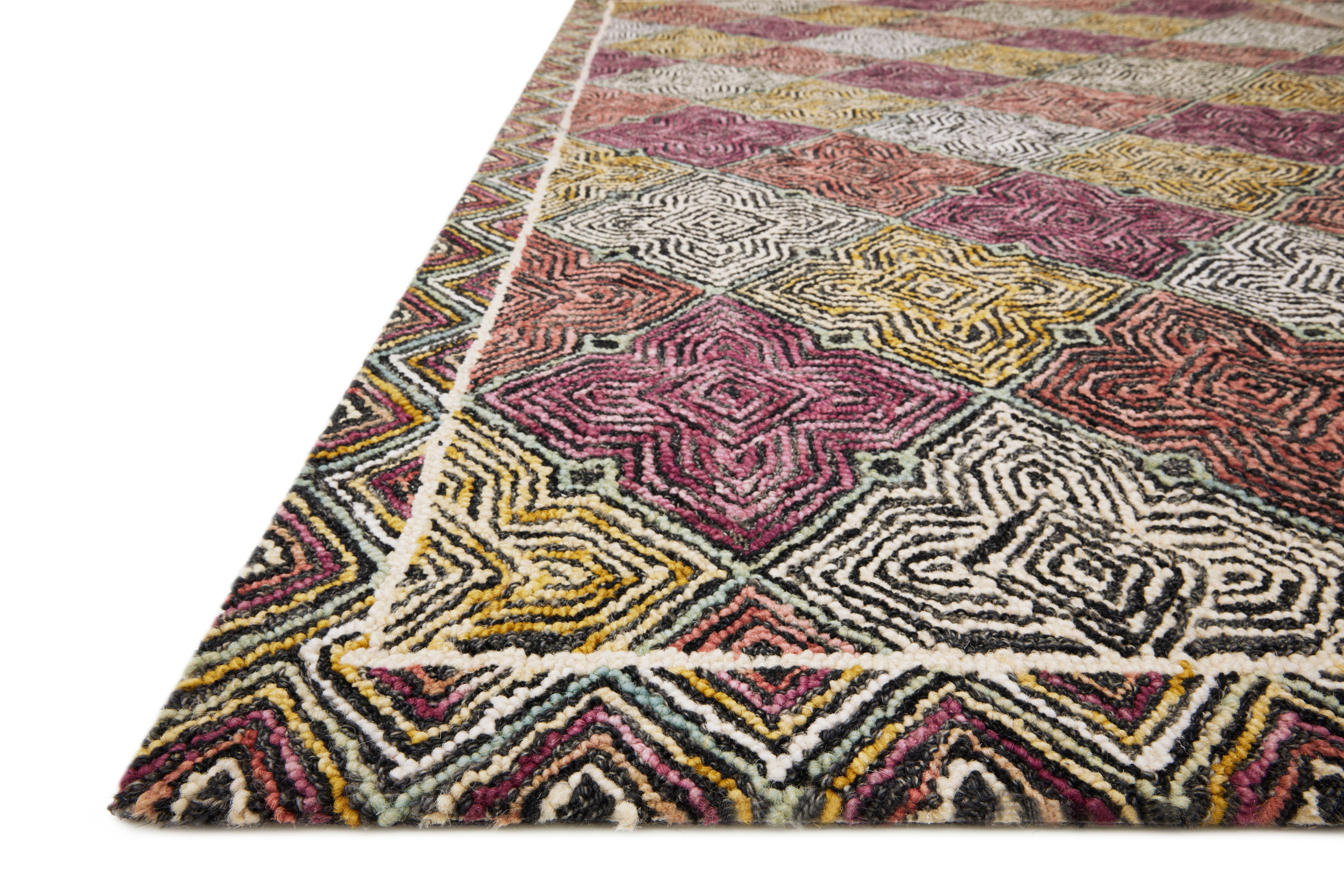 The Spectrum SPE-03 Charcoal / Multi Area Rug brings deep charcoal and vibrant multi-toned character and geometric and eclectic flair to your home in a hooked wool area rug