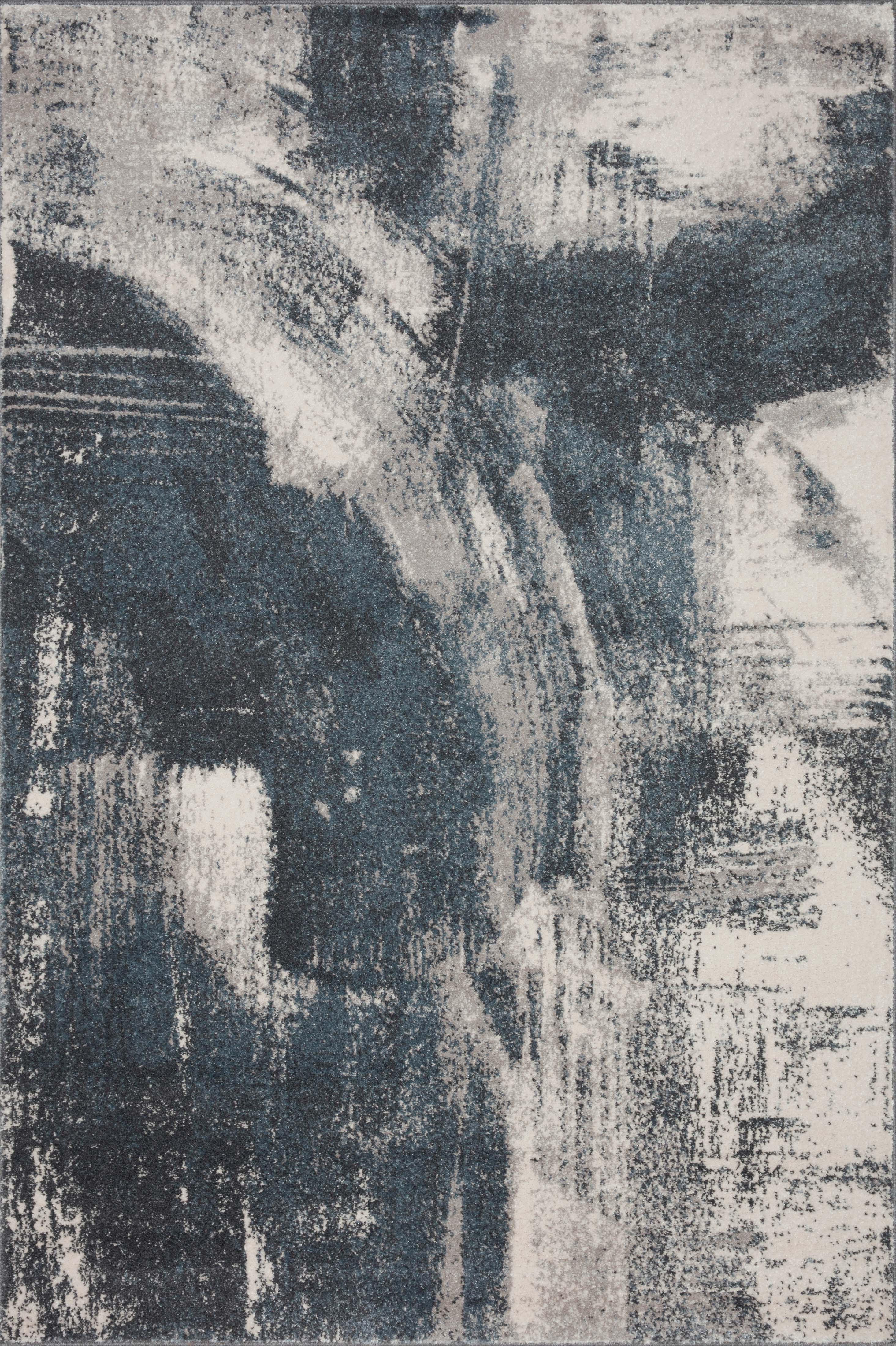 Dressed in deep indigo and refined ivory hues with abstract detail, the Spirit SPI-04 Indigo / Ivory Area Rug is a power-loomed 100% polypropylene area rug that completes any room
