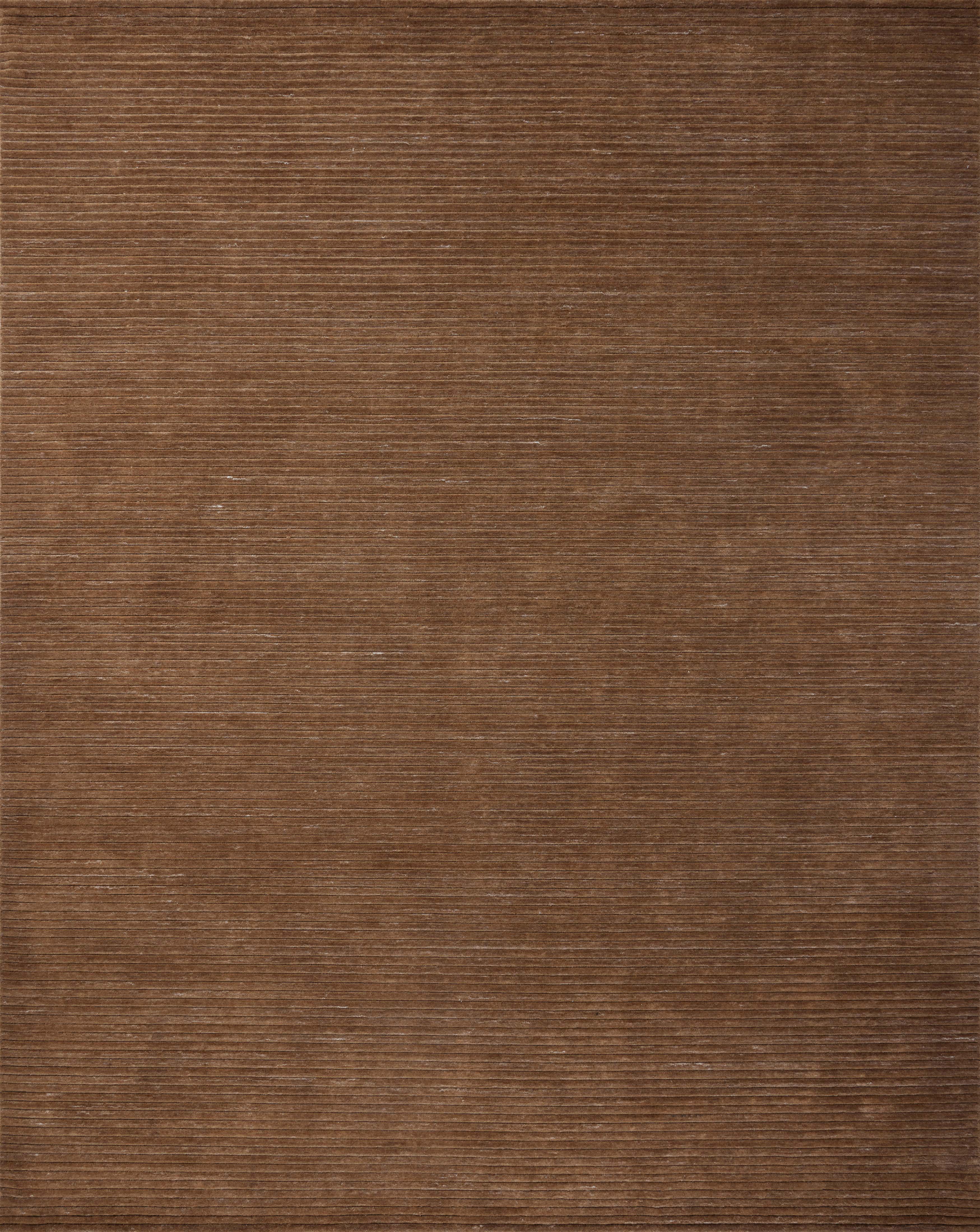 A hand-loomed polyester area rug in luxurious mocha tones, the Sterling STL-01 Mocha Area Rug grounds your room beautifully