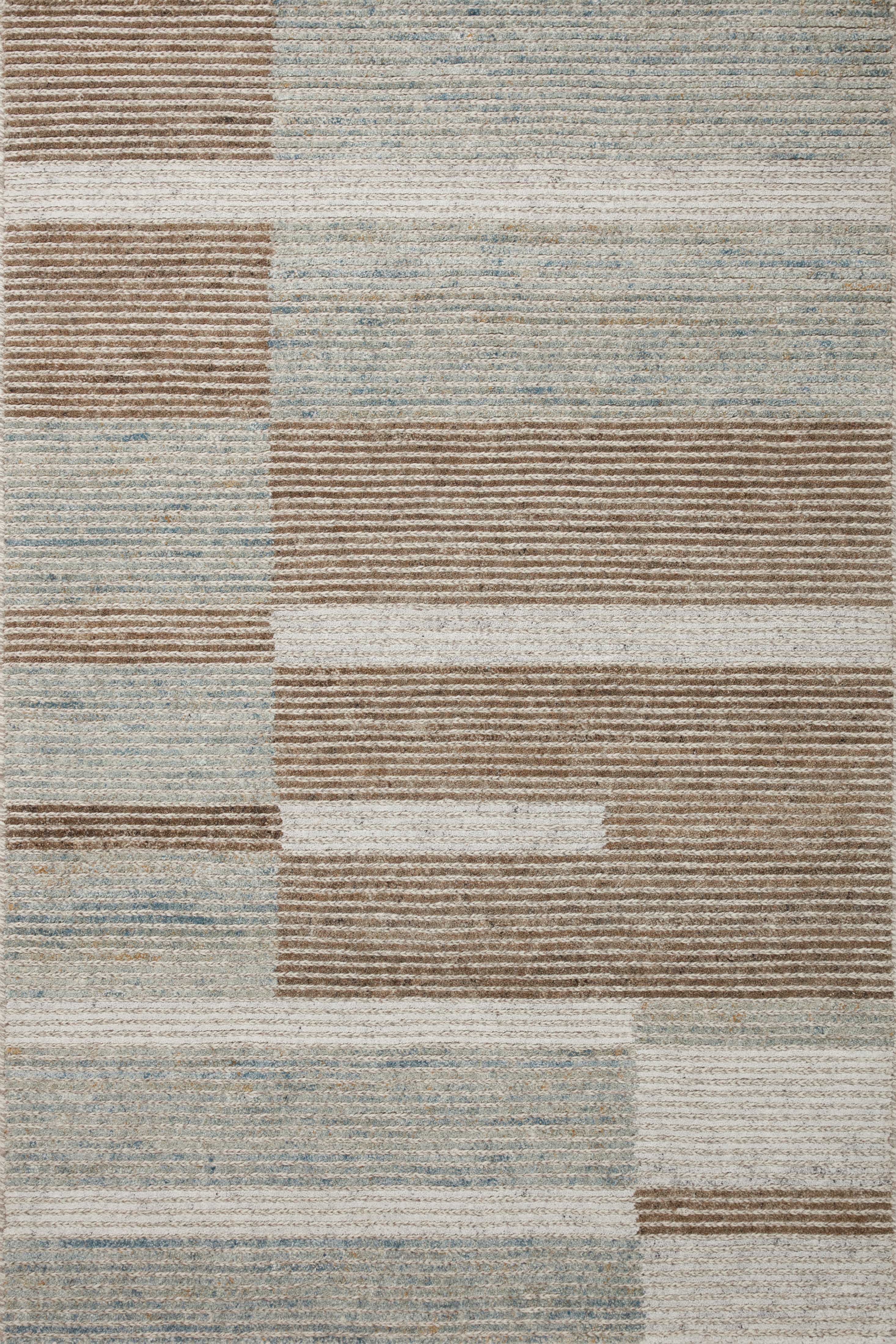 Layered in rich tobacco and tranquil lagoon hues with colorblock and ribbed patterns, the Stiles STI-02 Tobacco / Lagoon Area Rug is a hand-tufted 100% wool area rug perfect for any setting