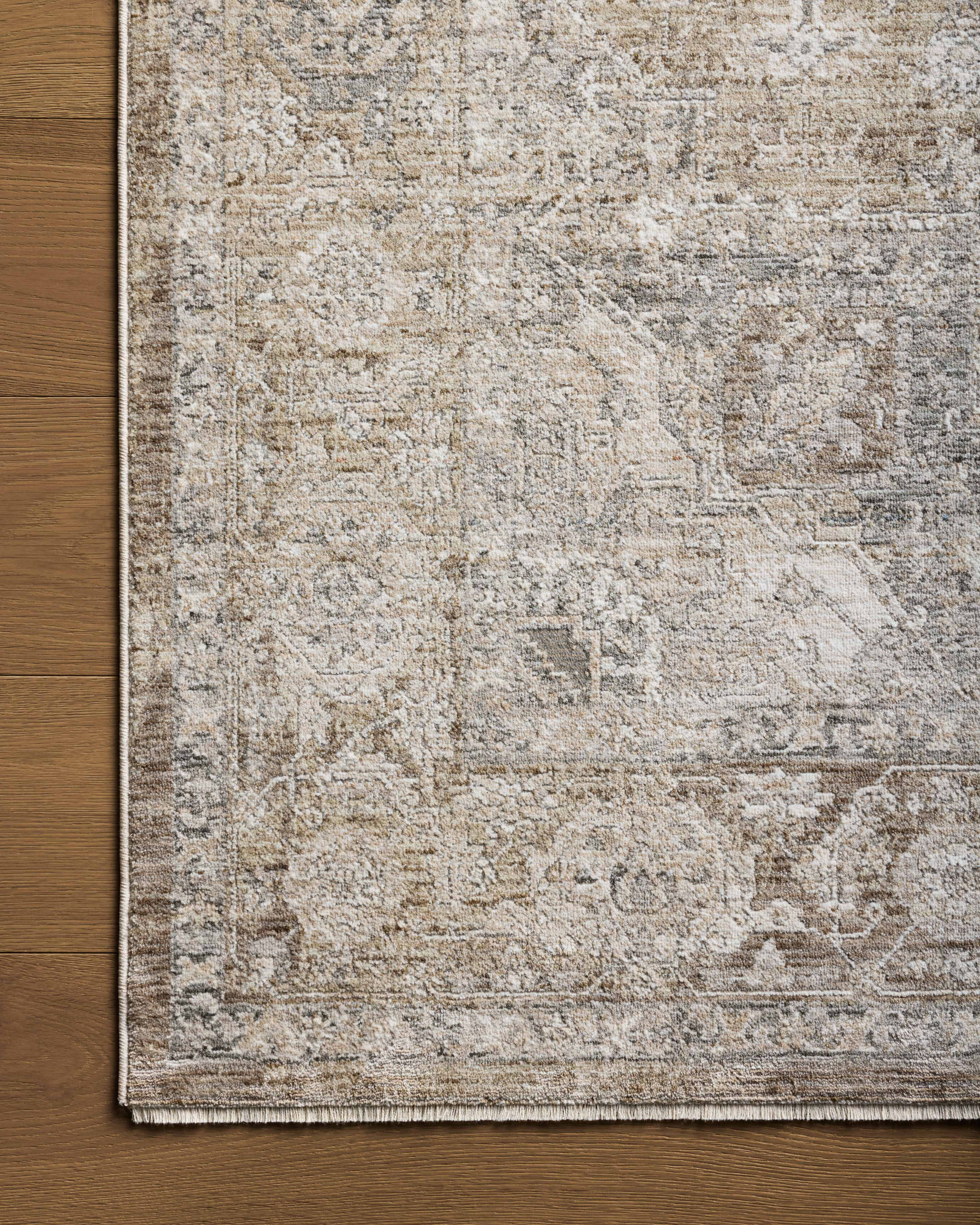 The Tabitha TAI-01 Khaki / Slate Area Rug showcases khaki and cool slate tones in a power-loomed polyester area rug with traditional style