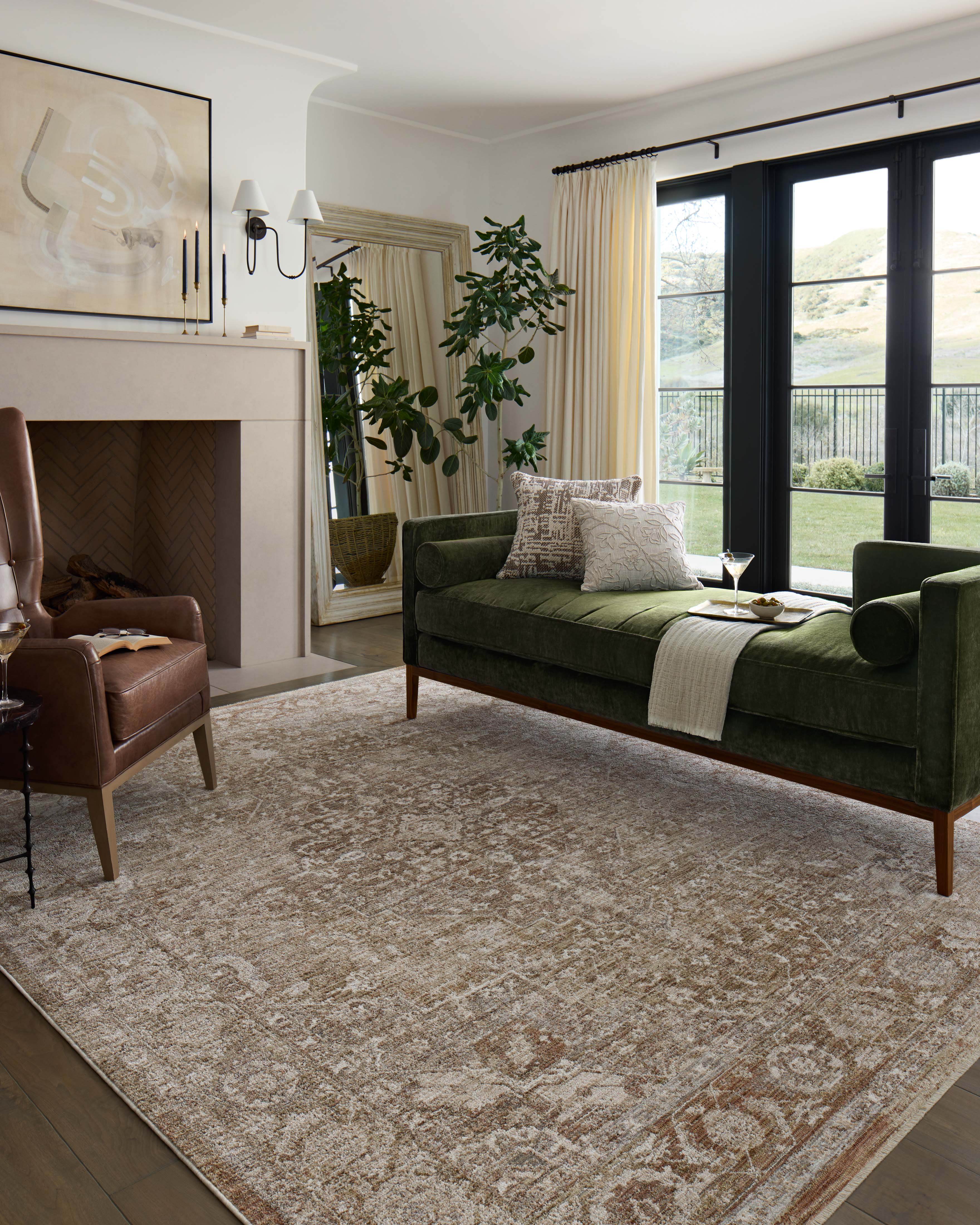 Featuring warm natural and earthy clay hues and traditional detail, the Tabitha TAI-01 Natural / Clay Area Rug is a power-loomed polyester area rug for any room