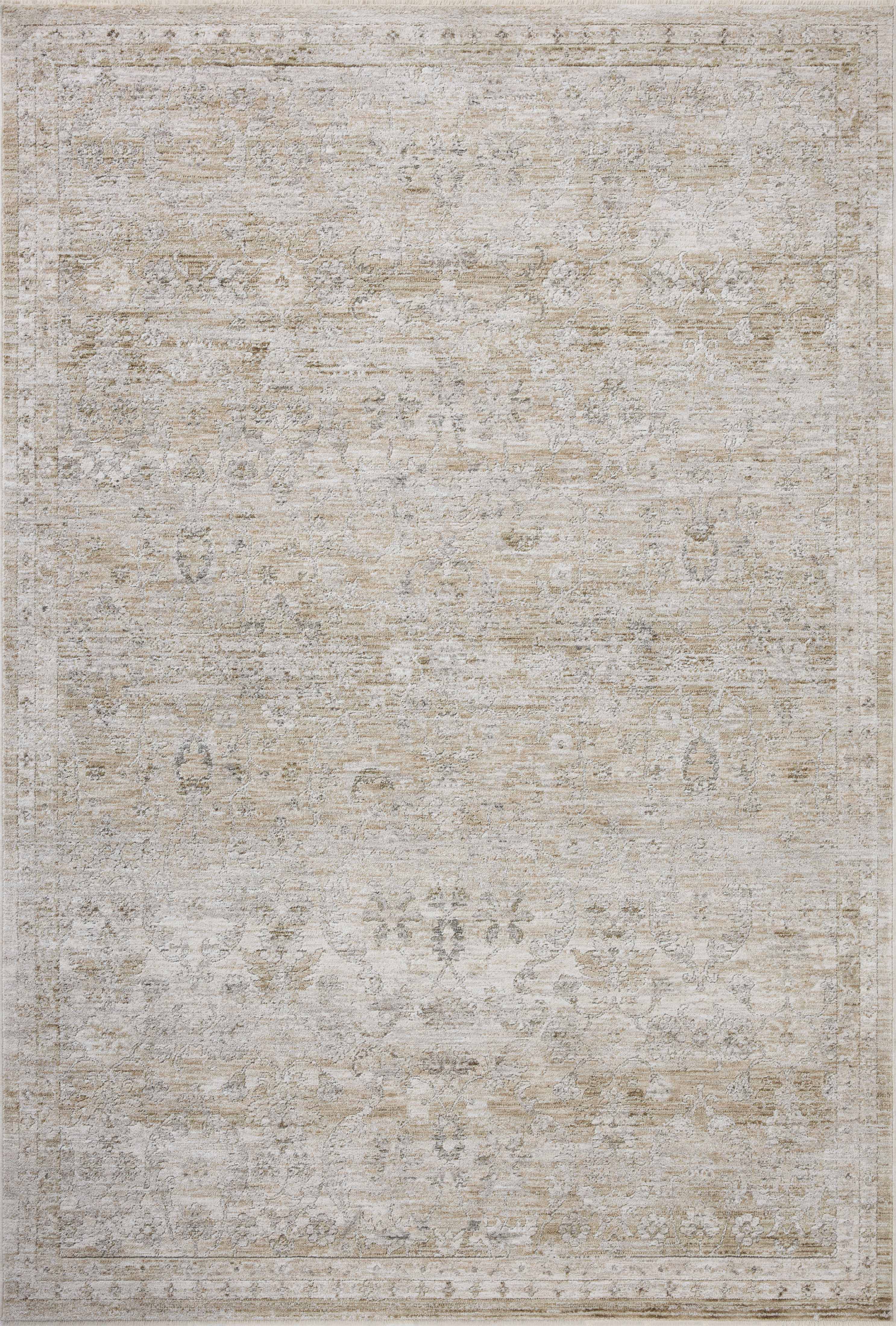 With refined ivory and khaki hues and traditional styling, the Tabitha TAI-03 Ivory / Khaki Area Rug is a power-loomed polyester area rug that elevates any room