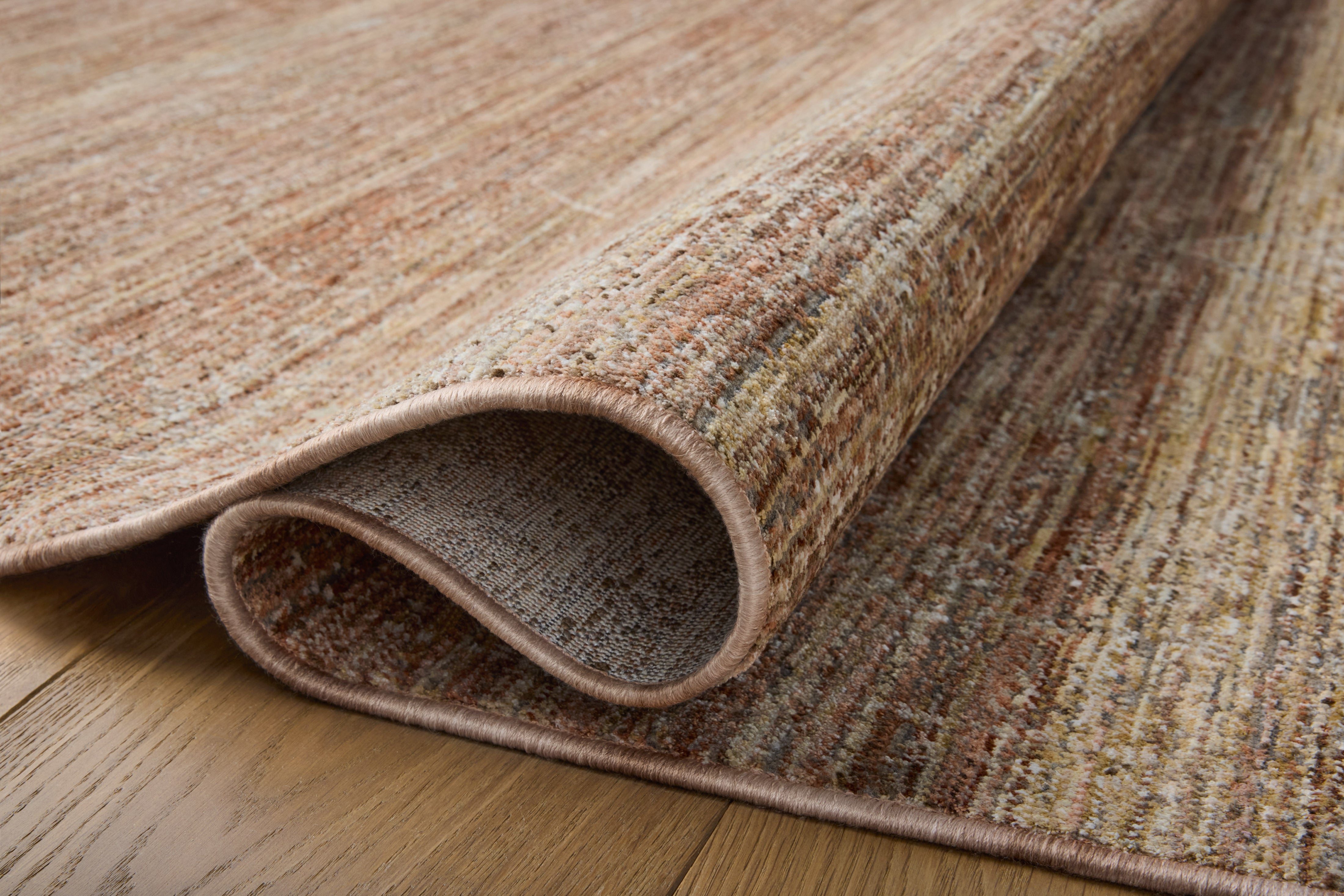 A stunning power-loomed polyester area rug with traditional detail, the Tabitha TAI-05 Clay / Natural Area Rug features earthy clay and warm natural tones for a polished look