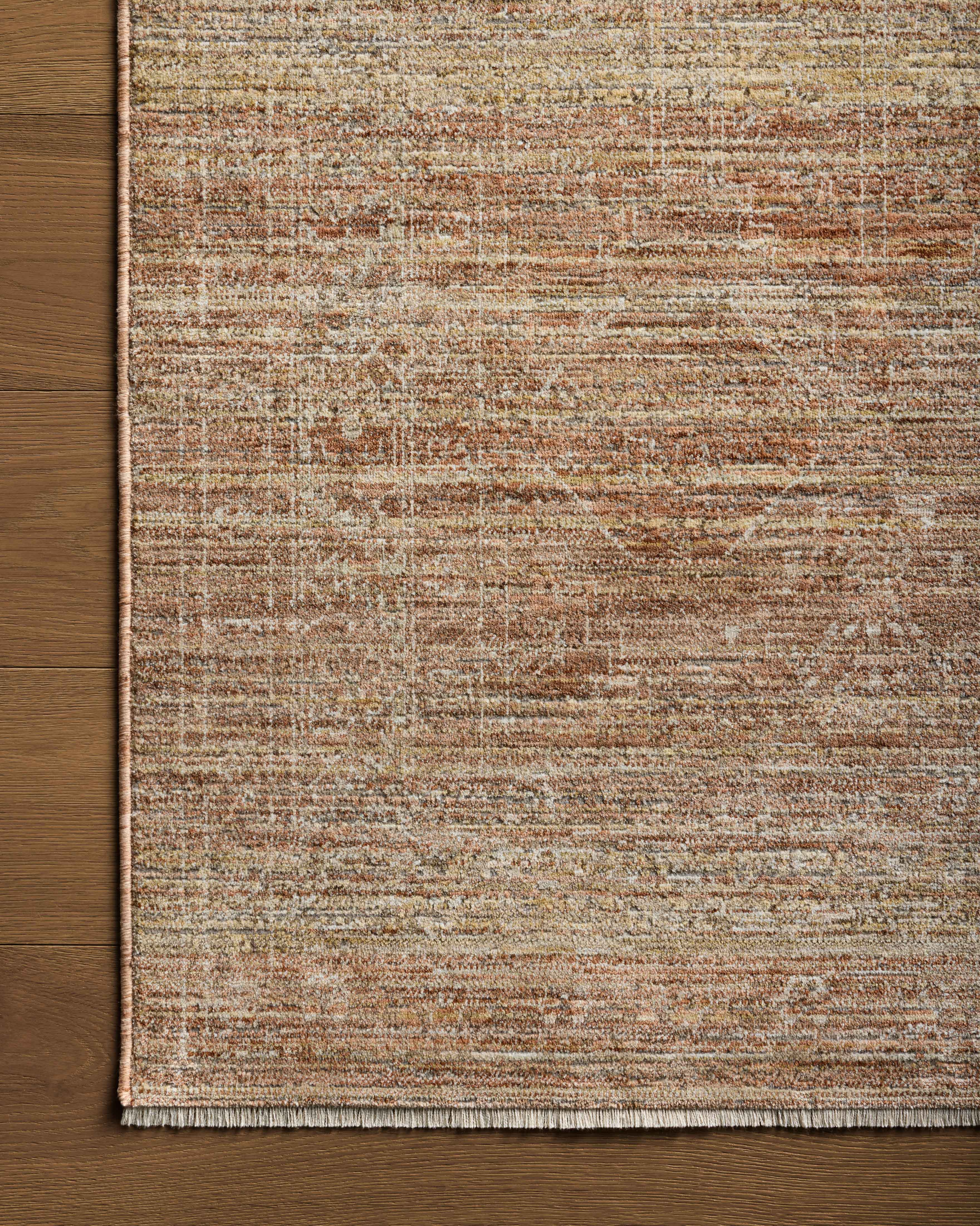 A stunning power-loomed polyester area rug with traditional detail, the Tabitha TAI-05 Clay / Natural Area Rug features earthy clay and warm natural tones for a polished look