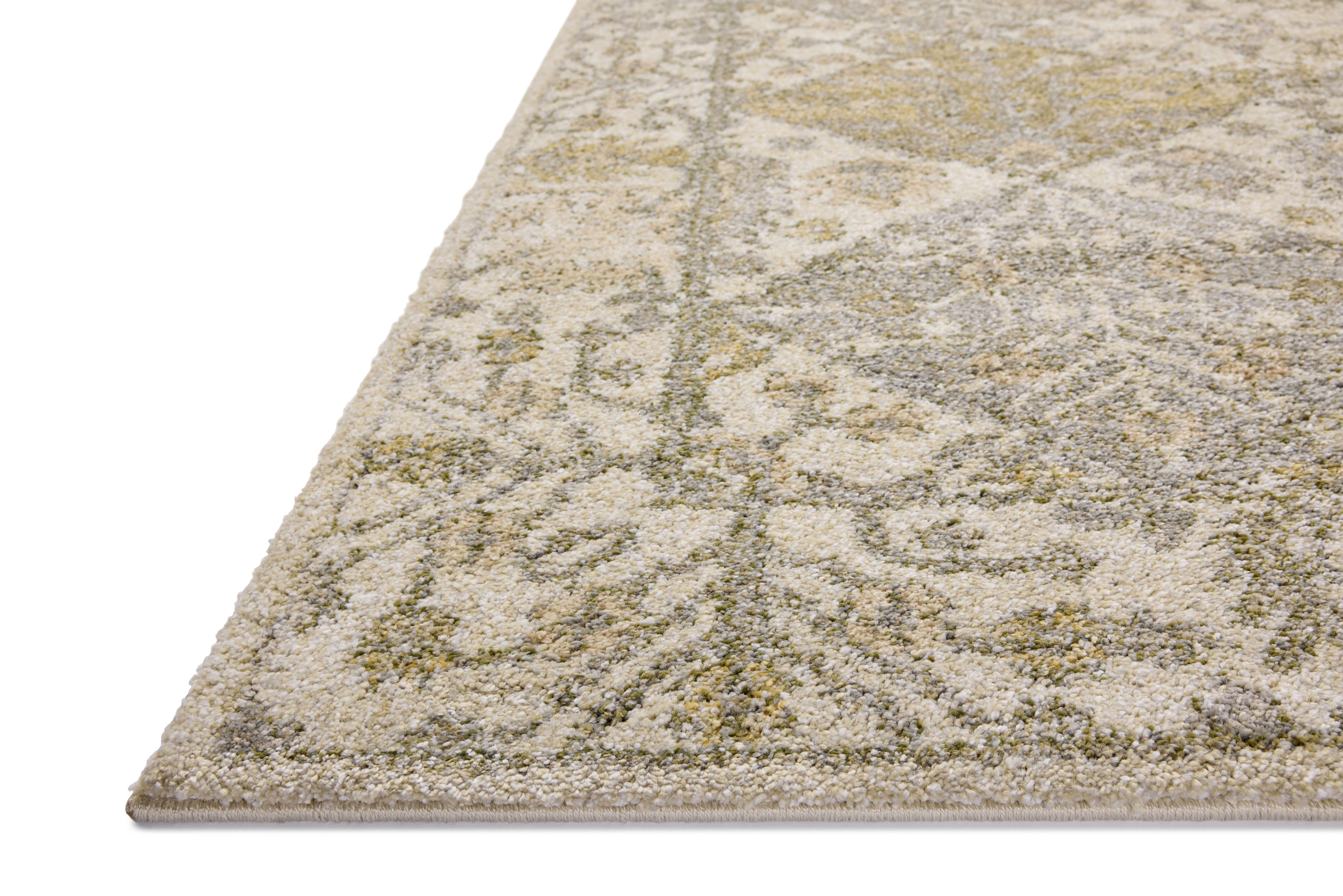 With warm beige and vibrant multi-toned hues, the Tamryn TAM-01 Beige / Multi Area Rug is a power-loomed 100% polypropylene area rug that elevates any room