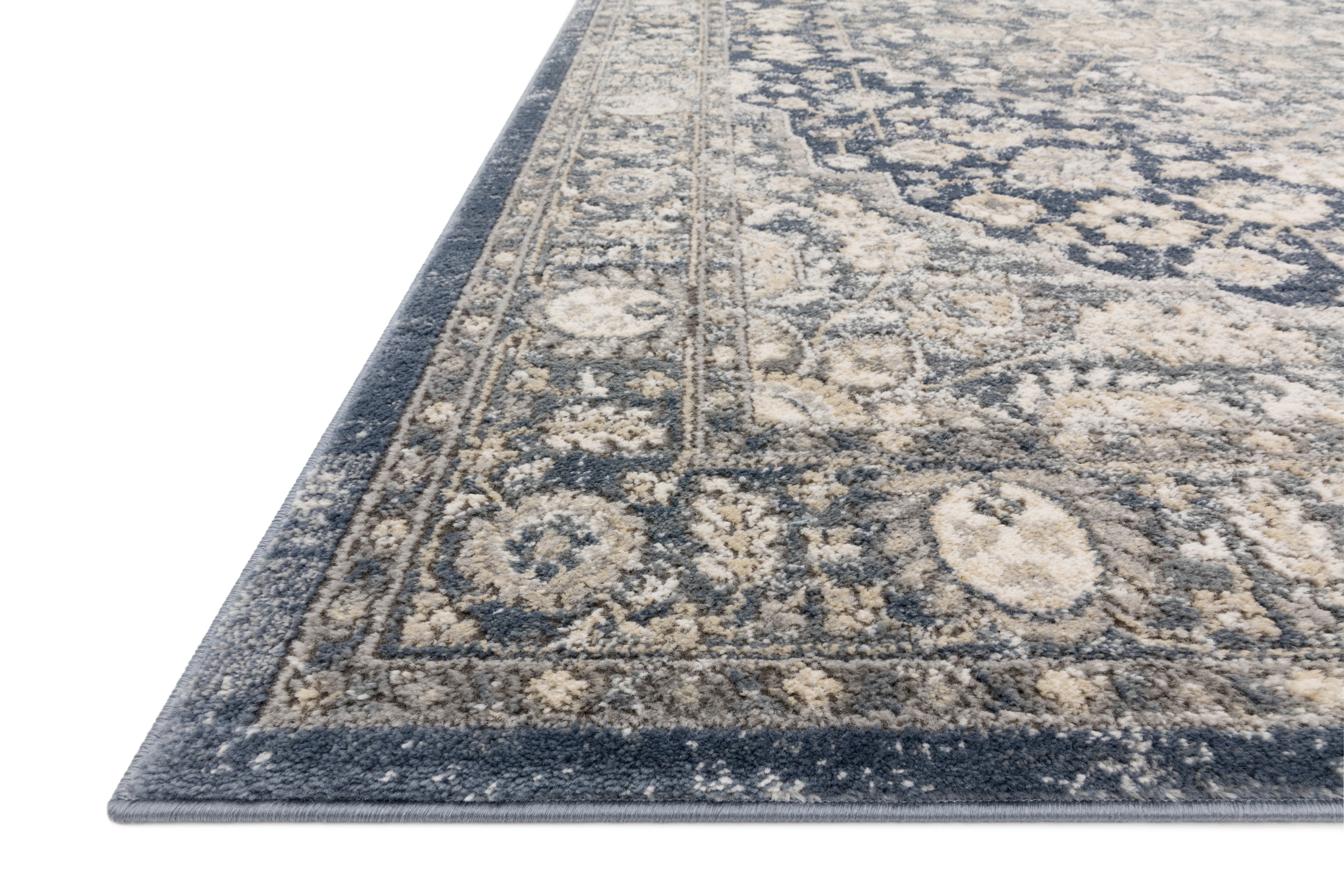 The Teagan TEA-01 Denim / Mist Area Rug combines casual denim and soft misty tones and contemporary patterns in a power-loomed polypropylene and polyester area rug for effortless elegance