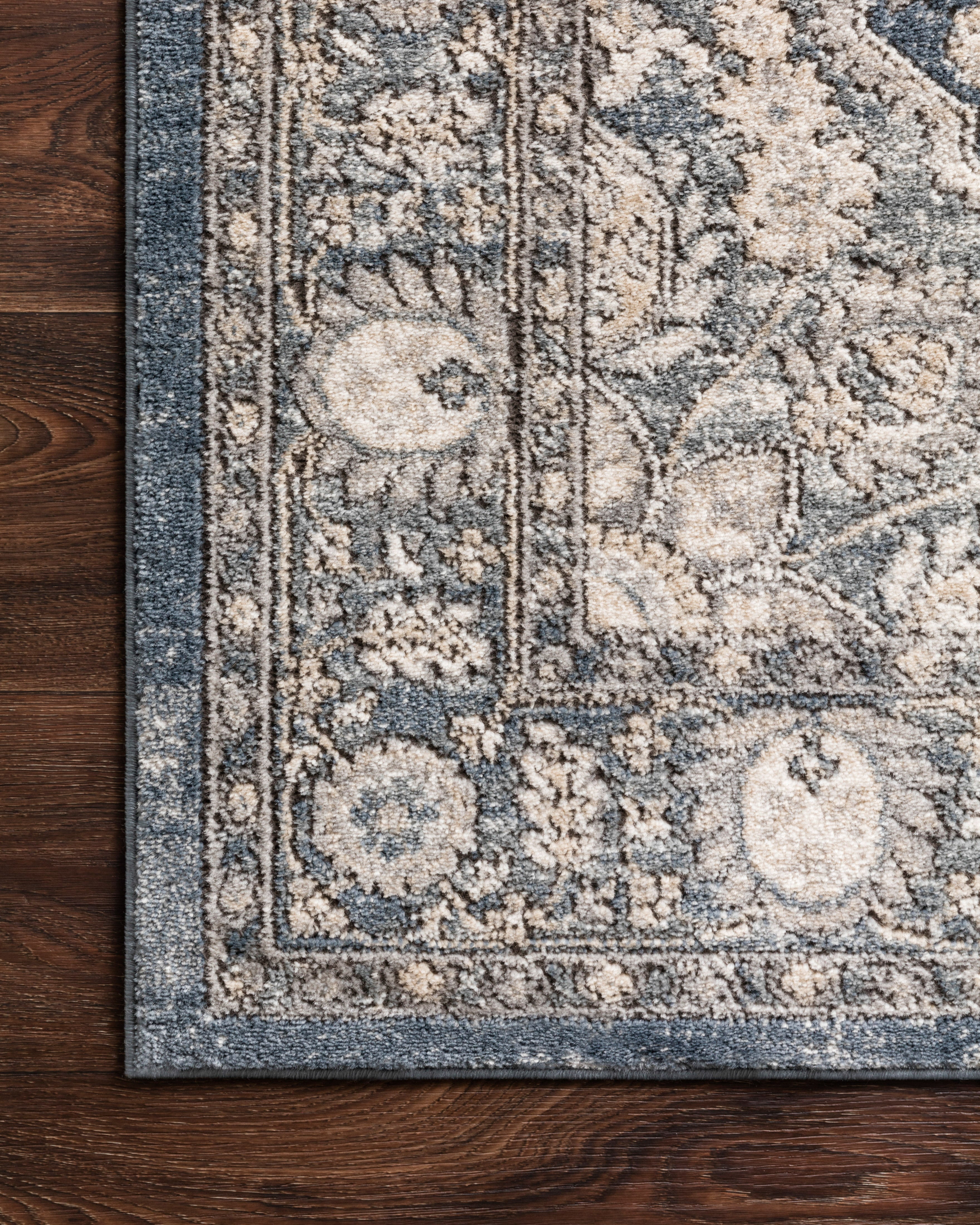 The Teagan TEA-01 Denim / Mist Area Rug combines casual denim and soft misty tones and contemporary patterns in a power-loomed polypropylene and polyester area rug for effortless elegance