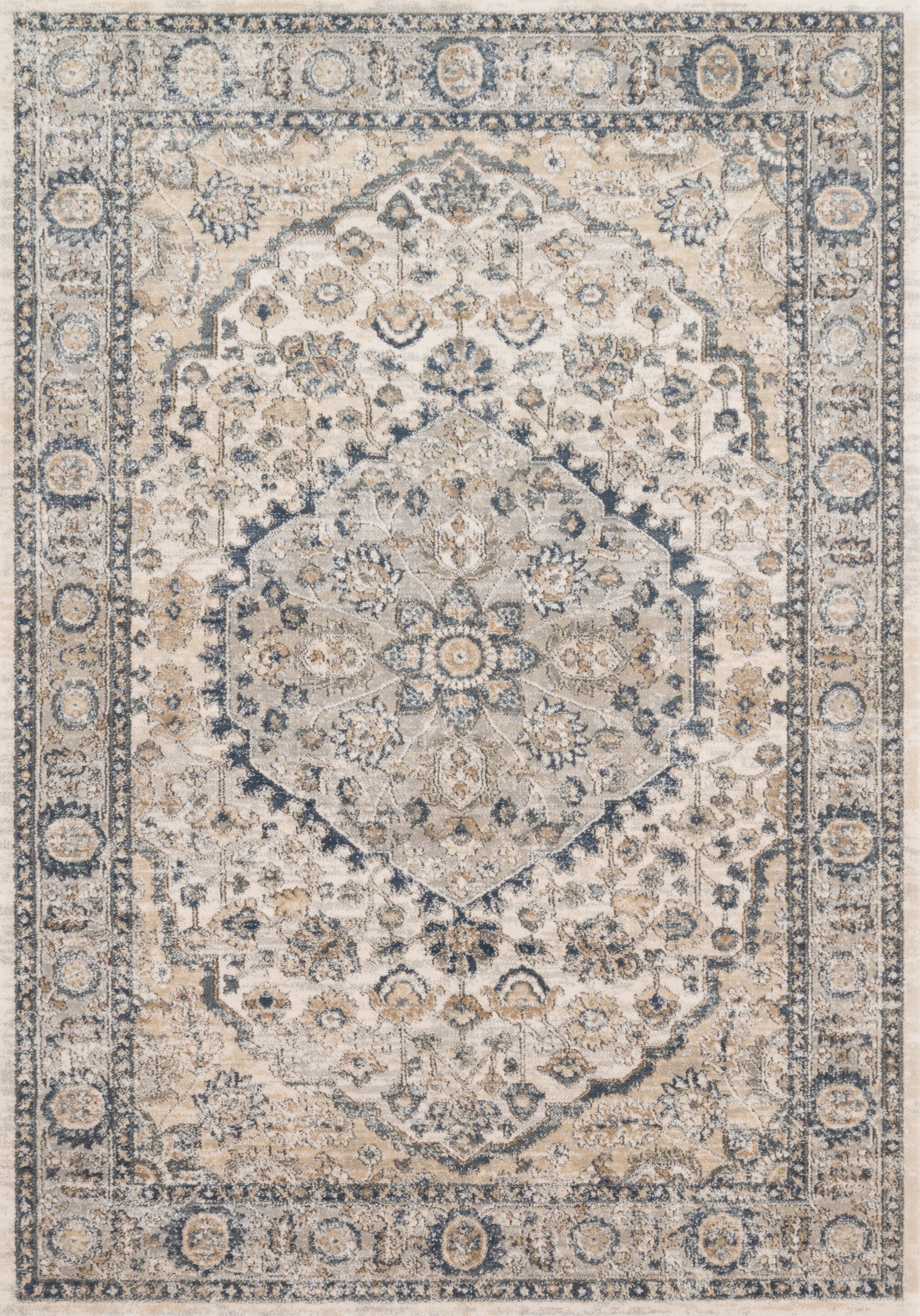 A power-loomed polypropylene and polyester area rug featuring contemporary design and warm natural and light grey tones, the Teagan TEA-01 Natural / Lt. Grey Area Rug adds character to any room