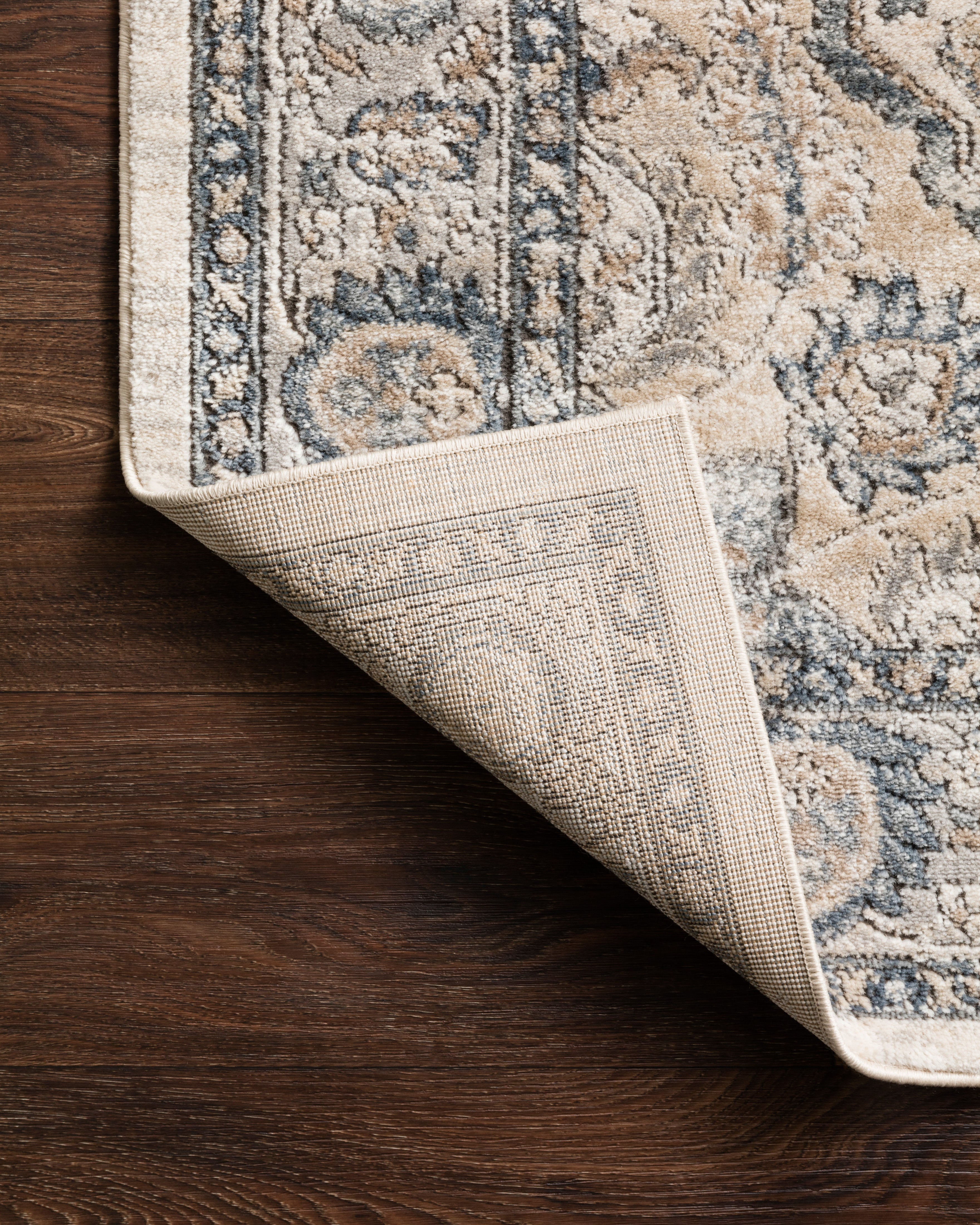A power-loomed polypropylene and polyester area rug featuring contemporary design and warm natural and light grey tones, the Teagan TEA-01 Natural / Lt. Grey Area Rug adds character to any room