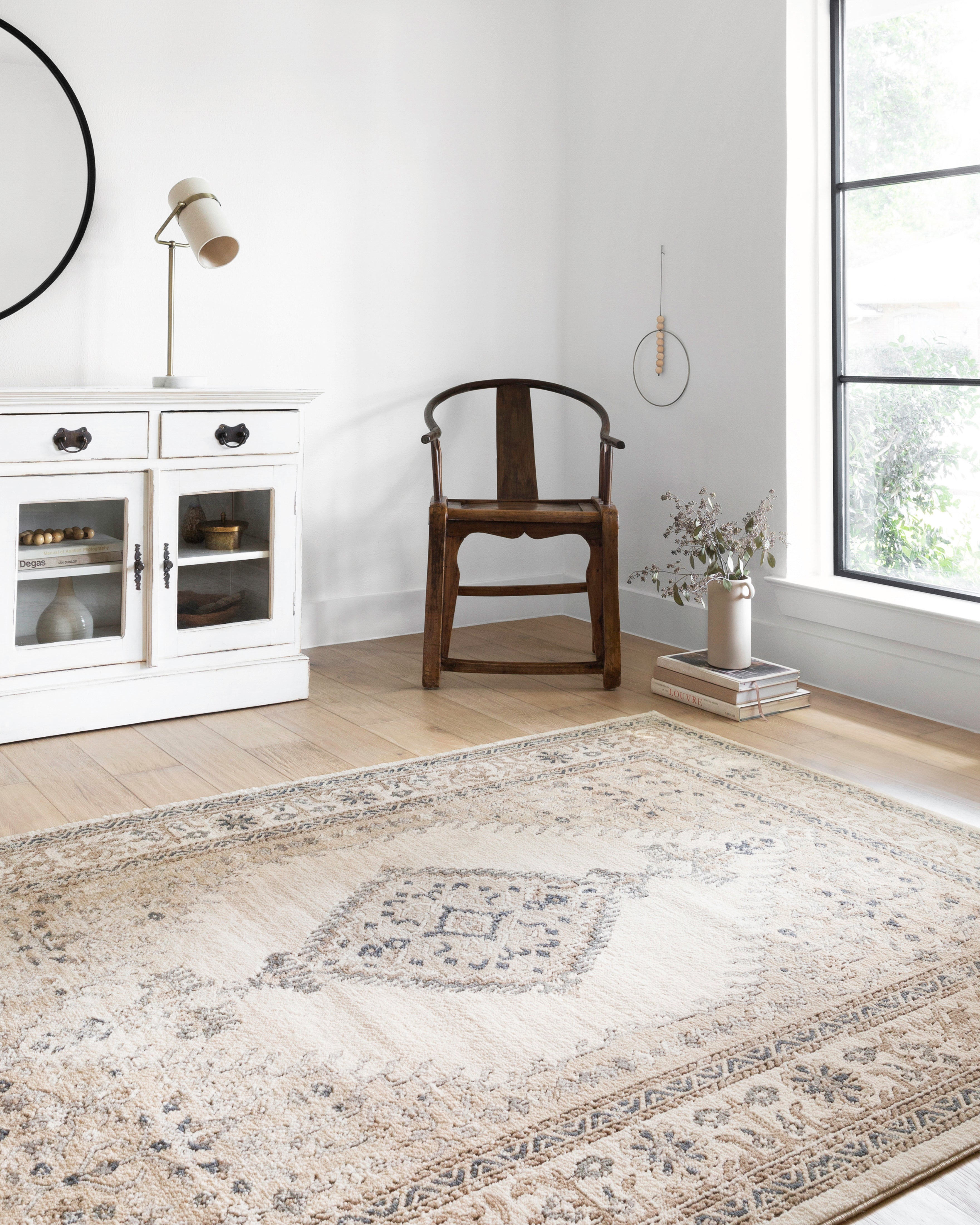 Rich in cozy oatmeal and refined ivory hues with contemporary detail, the Teagan TEA-02 Oatmeal / Ivory Area Rug is a power-loomed polypropylene and polyester area rug built for style and comfort