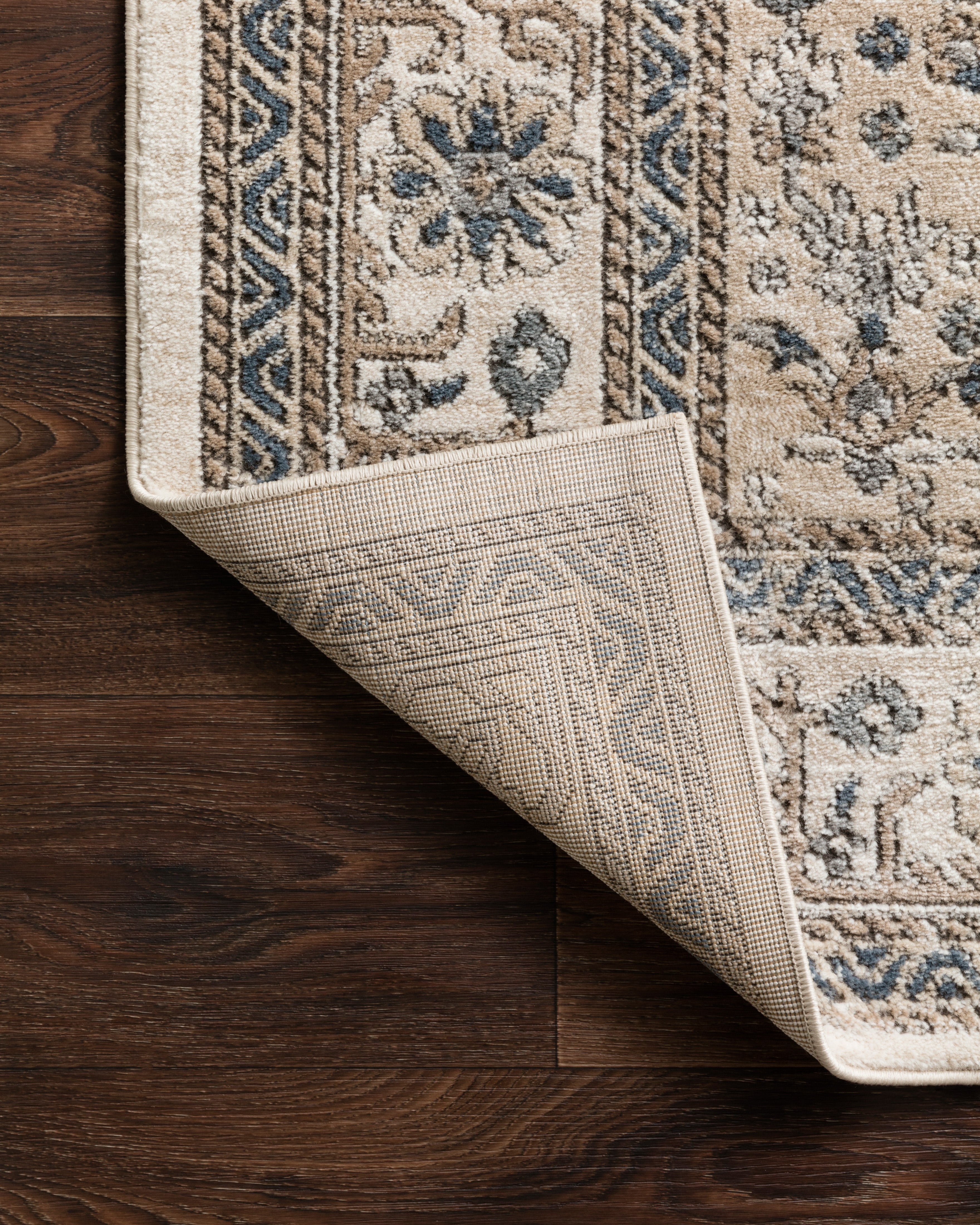 Rich in cozy oatmeal and refined ivory hues with contemporary detail, the Teagan TEA-02 Oatmeal / Ivory Area Rug is a power-loomed polypropylene and polyester area rug built for style and comfort