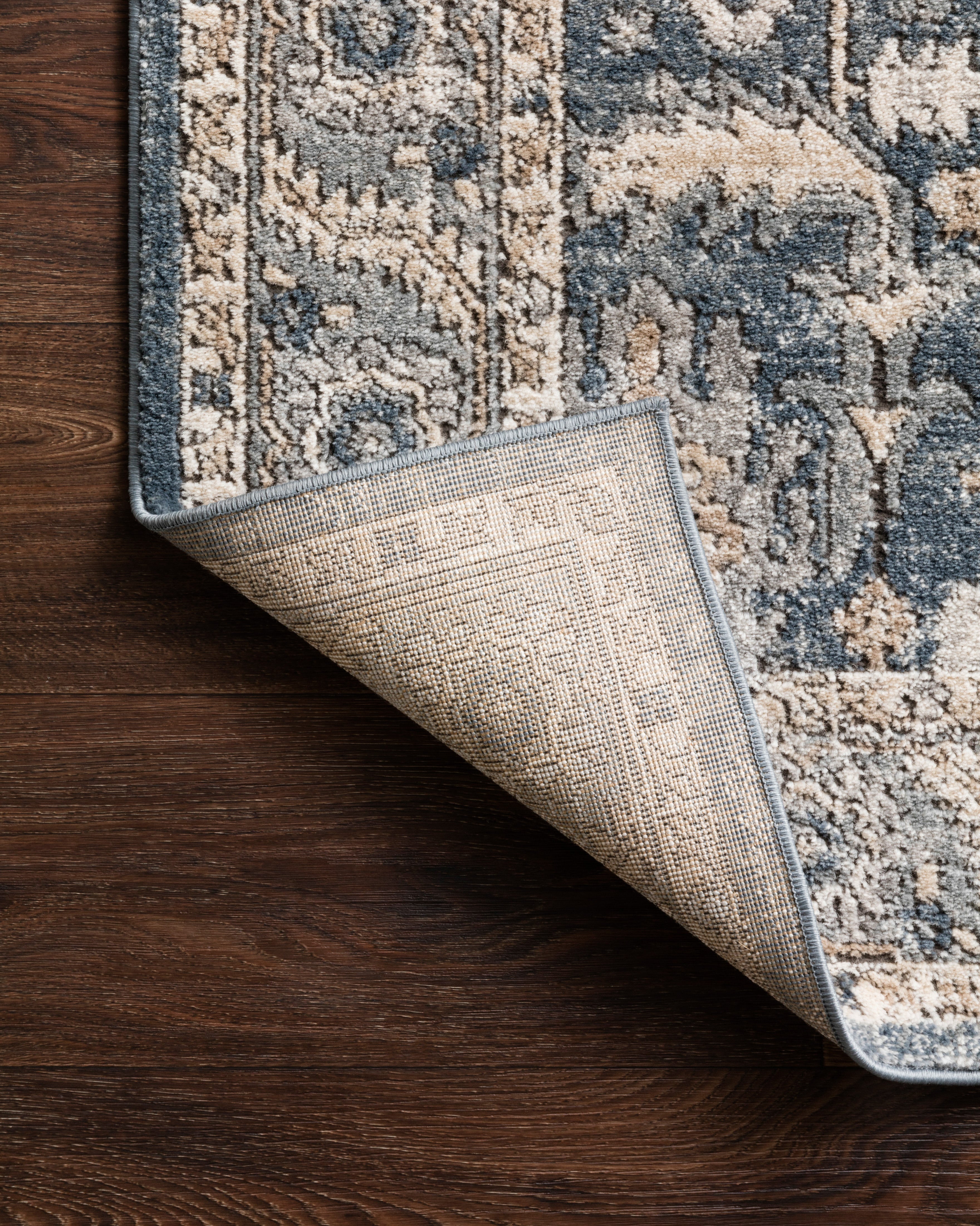 The Teagan TEA-03 Denim / Pebble Area Rug offers casual denim and subtle pebble sophistication and contemporary charm in a power-loomed polypropylene and polyester area rug