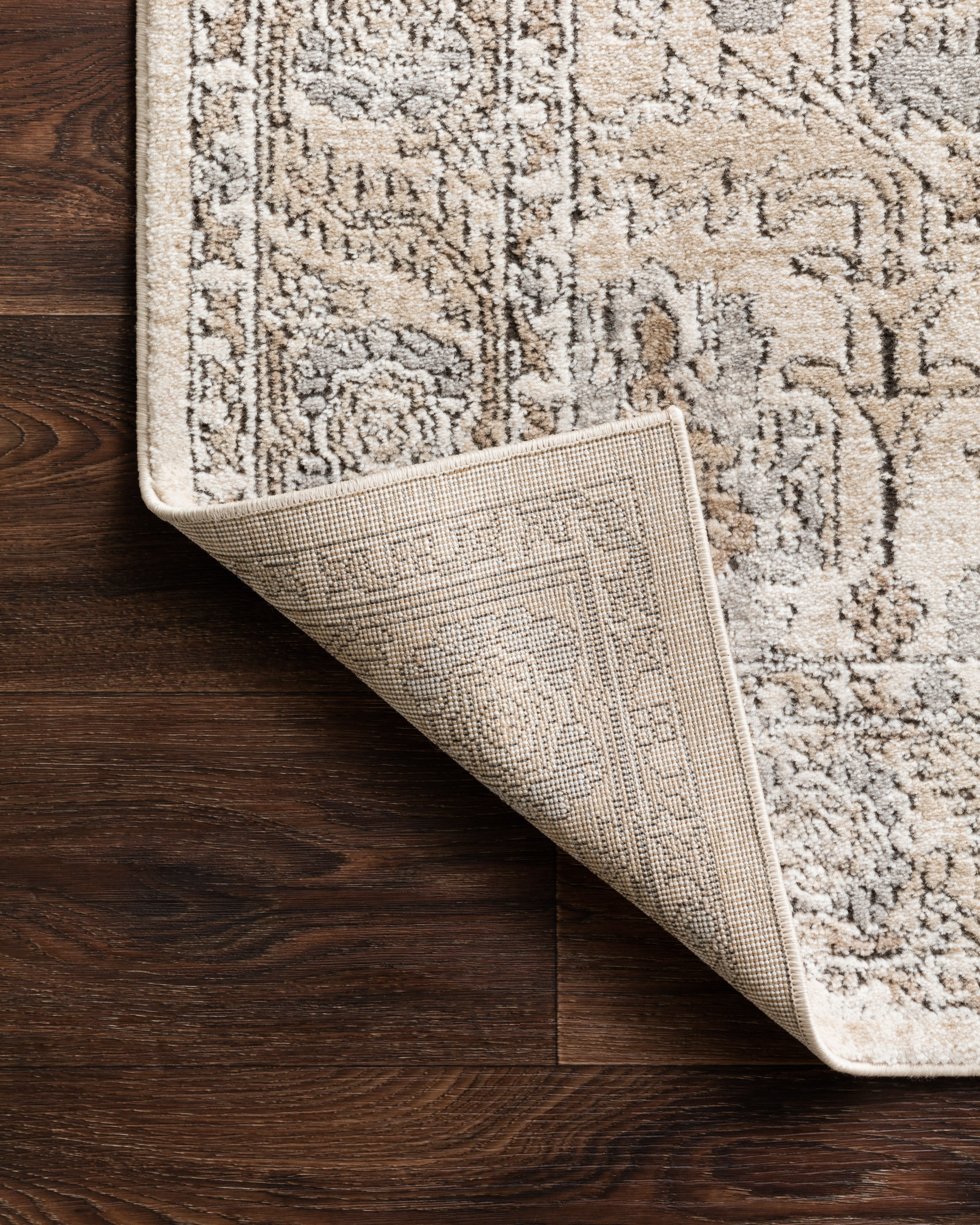 Expertly crafted as a power-loomed polypropylene and polyester area rug with contemporary artistry, the Teagan TEA-03 Ivory / Sand Area Rug captures refined ivory and sandy tones beautifully