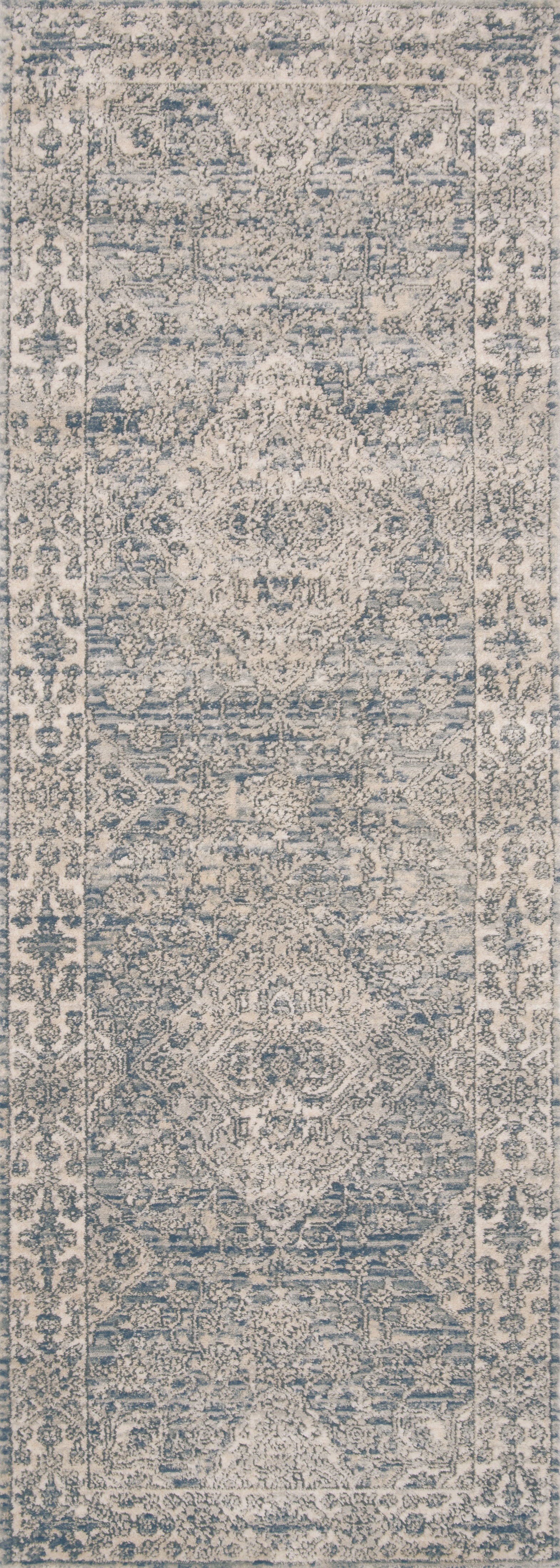 The Teagan TEA-04 Sky / Natural Area Rug brings breezy sky-blue and warm natural character and contemporary flair to your home in a power-loomed polypropylene and polyester area rug