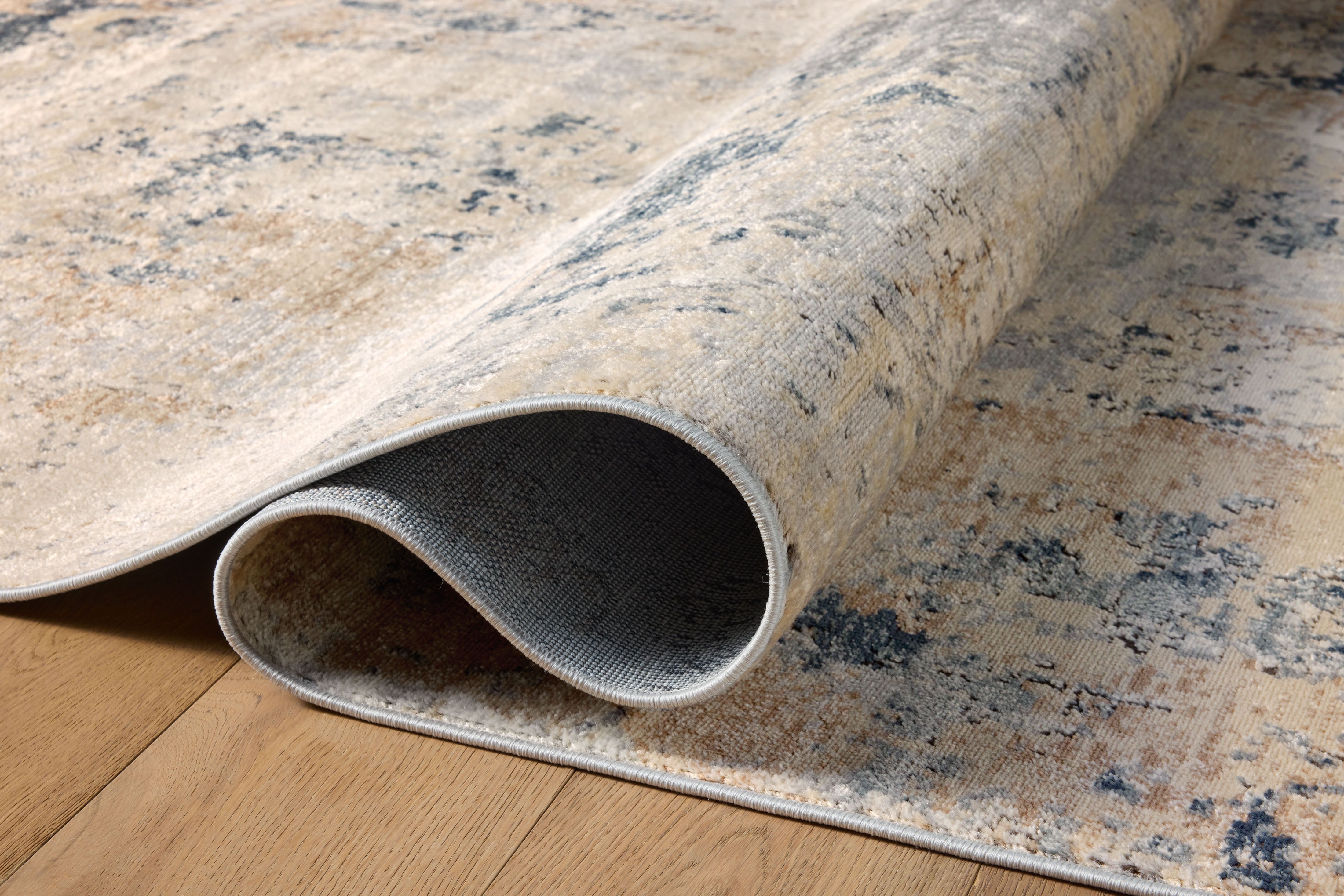 A power-loomed polypropylene and polyester area rug with contemporary design in sandy and soft misty hues, the Teagan TEA-06 Sand / Mist Area Rug is a standout in any décor