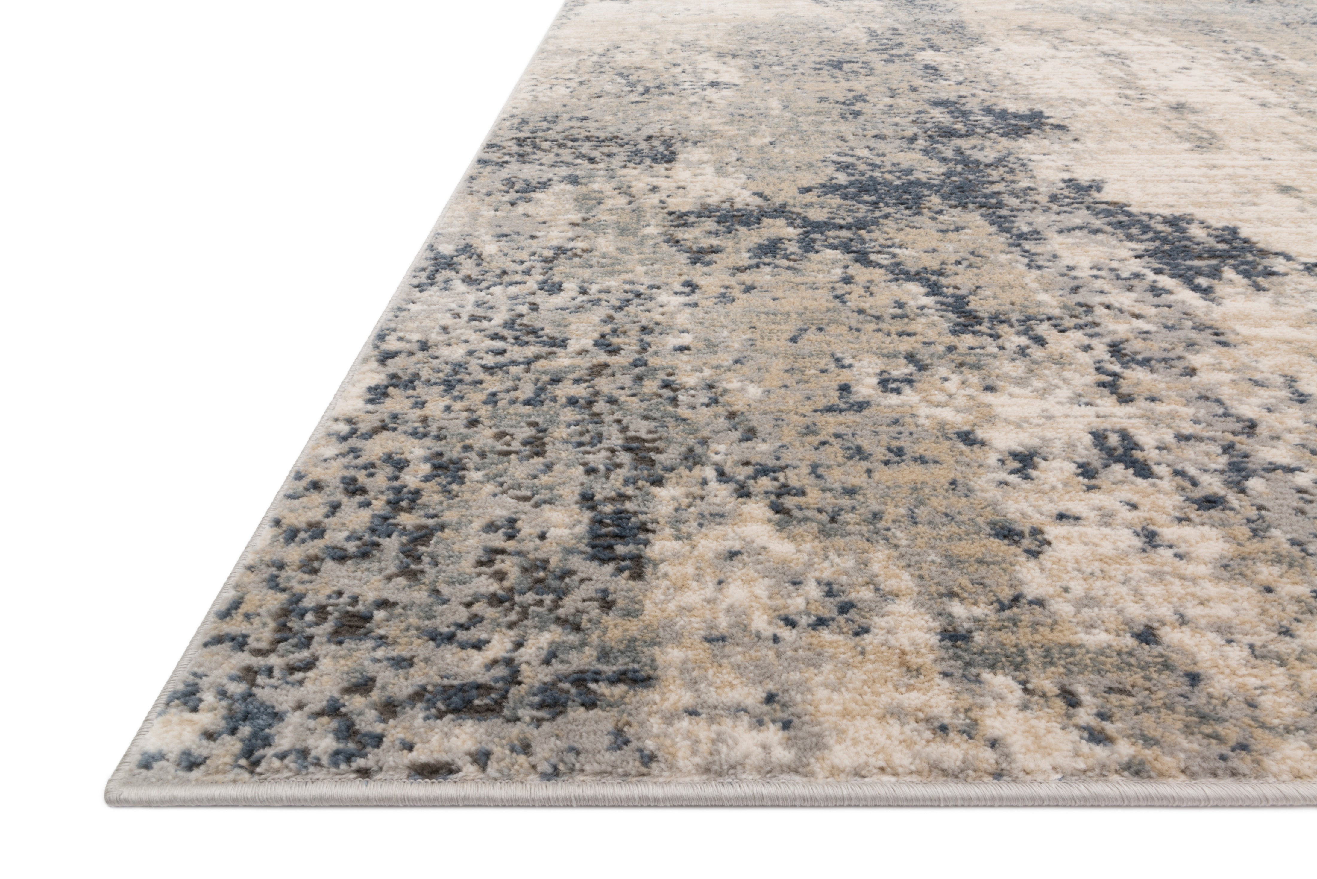The Teagan TEA-07 Natural / Denim Area Rug highlights warm natural and casual denim tones and contemporary texture in a beautifully made power-loomed polypropylene and polyester area rug