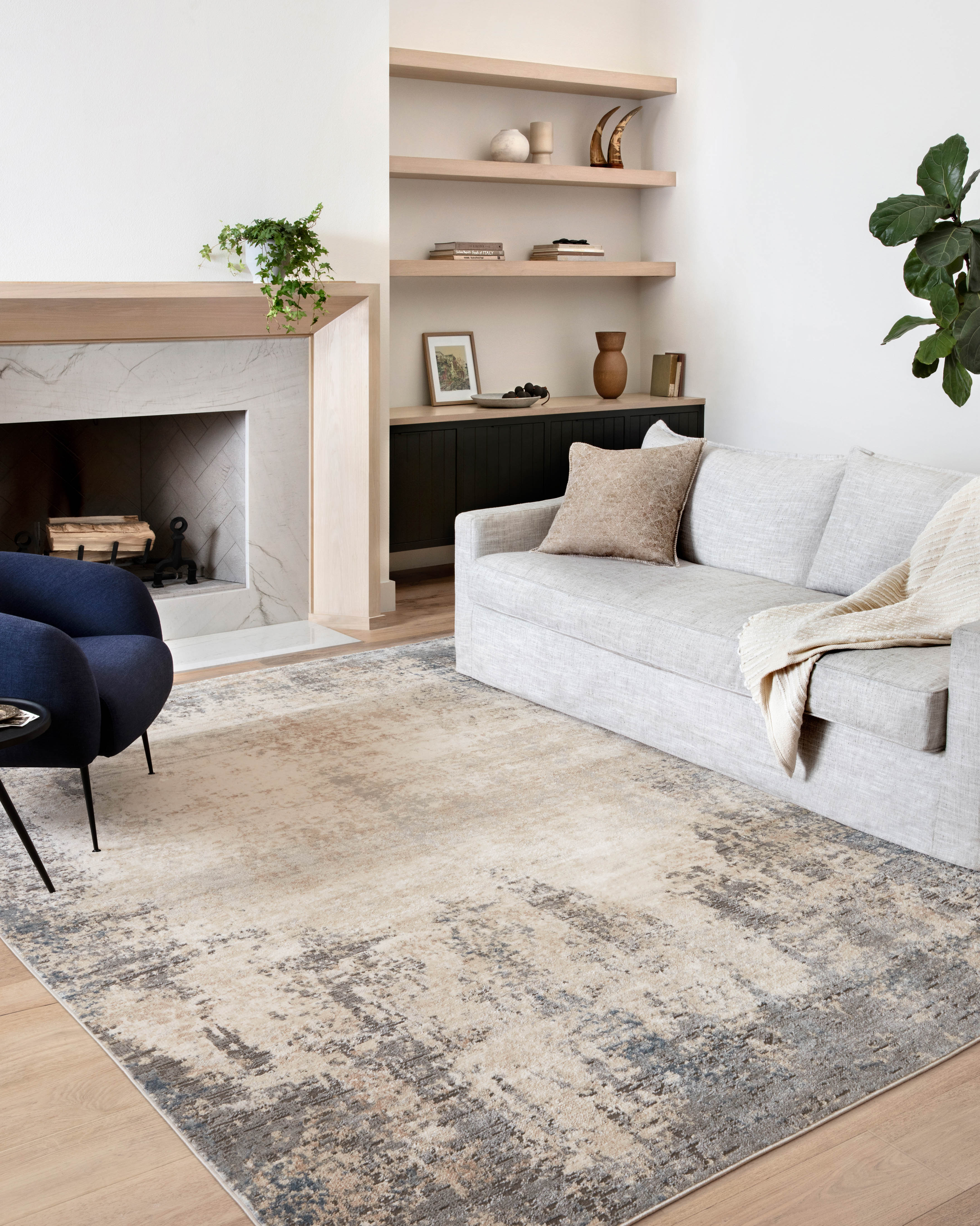 Dressed in refined ivory and soft misty hues with contemporary detail, the Teagan TEA-08 Ivory / Mist Area Rug is a power-loomed polypropylene and polyester area rug that completes any room