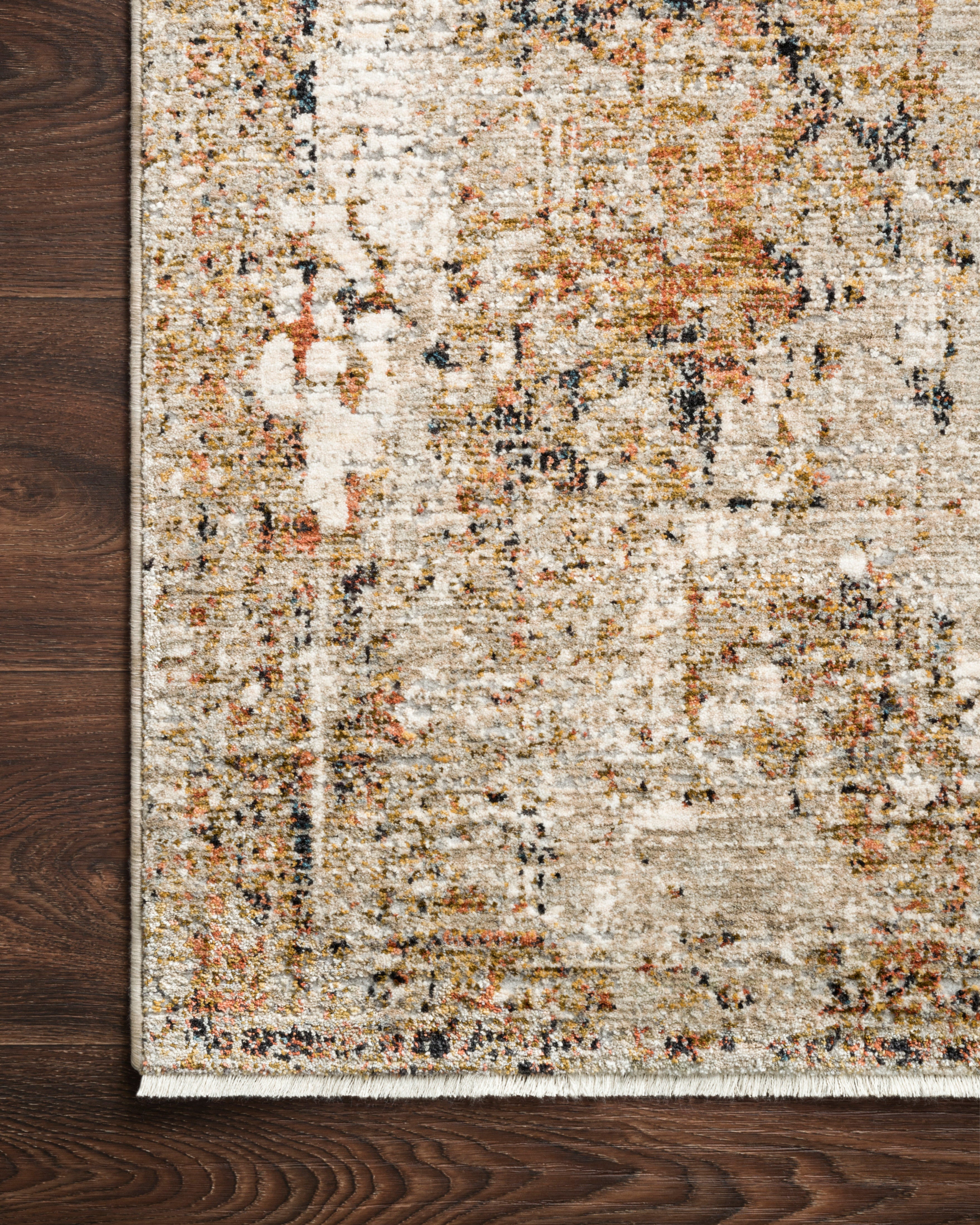 A power-loomed polyester pile and rayon area rug in versatile taupe and radiant gold tones, the Theia THE-02 Taupe / Gold Area Rug grounds your room beautifully