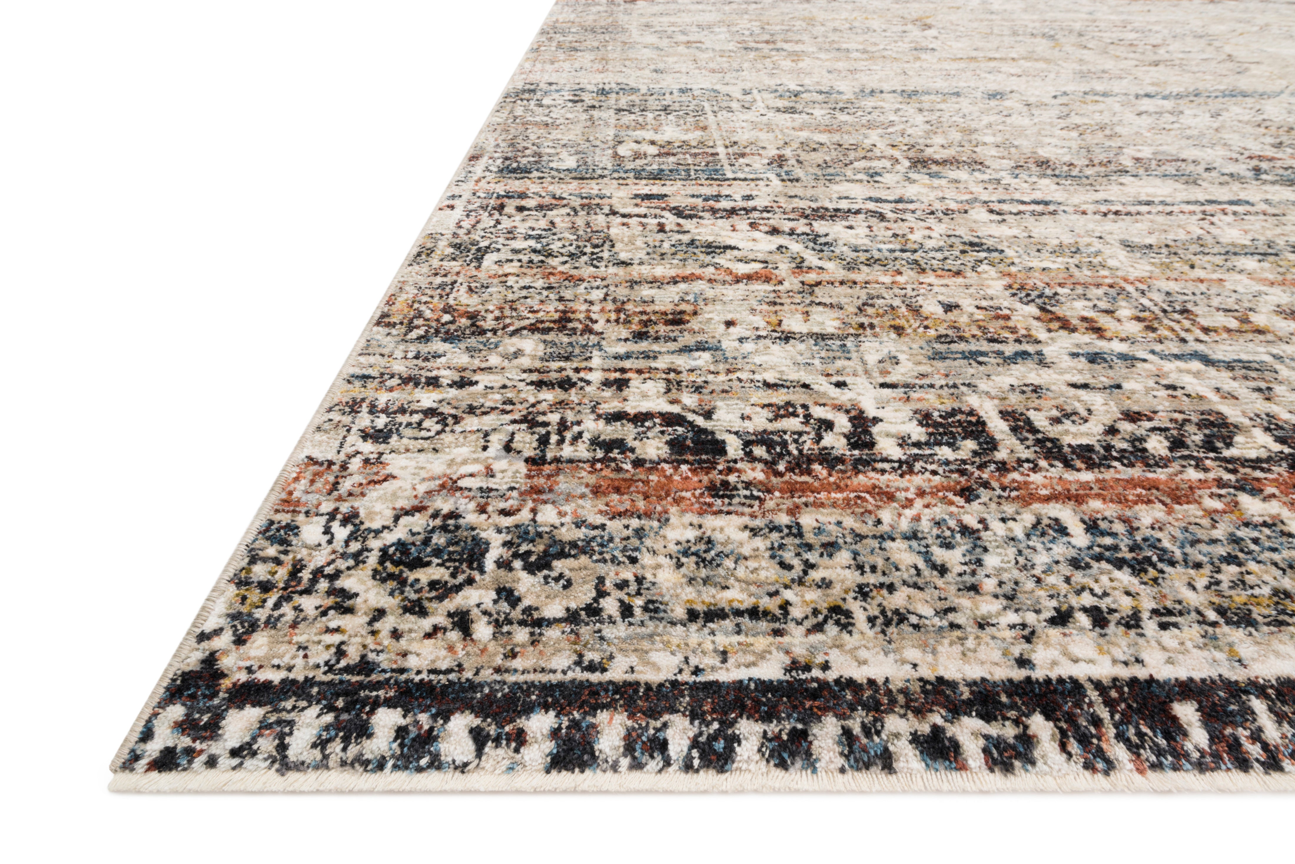 The Theia THE-03 Taupe / Multi Area Rug is a power-loomed polyester pile and rayon area rug that radiates versatile taupe and vibrant multi-toned charm
