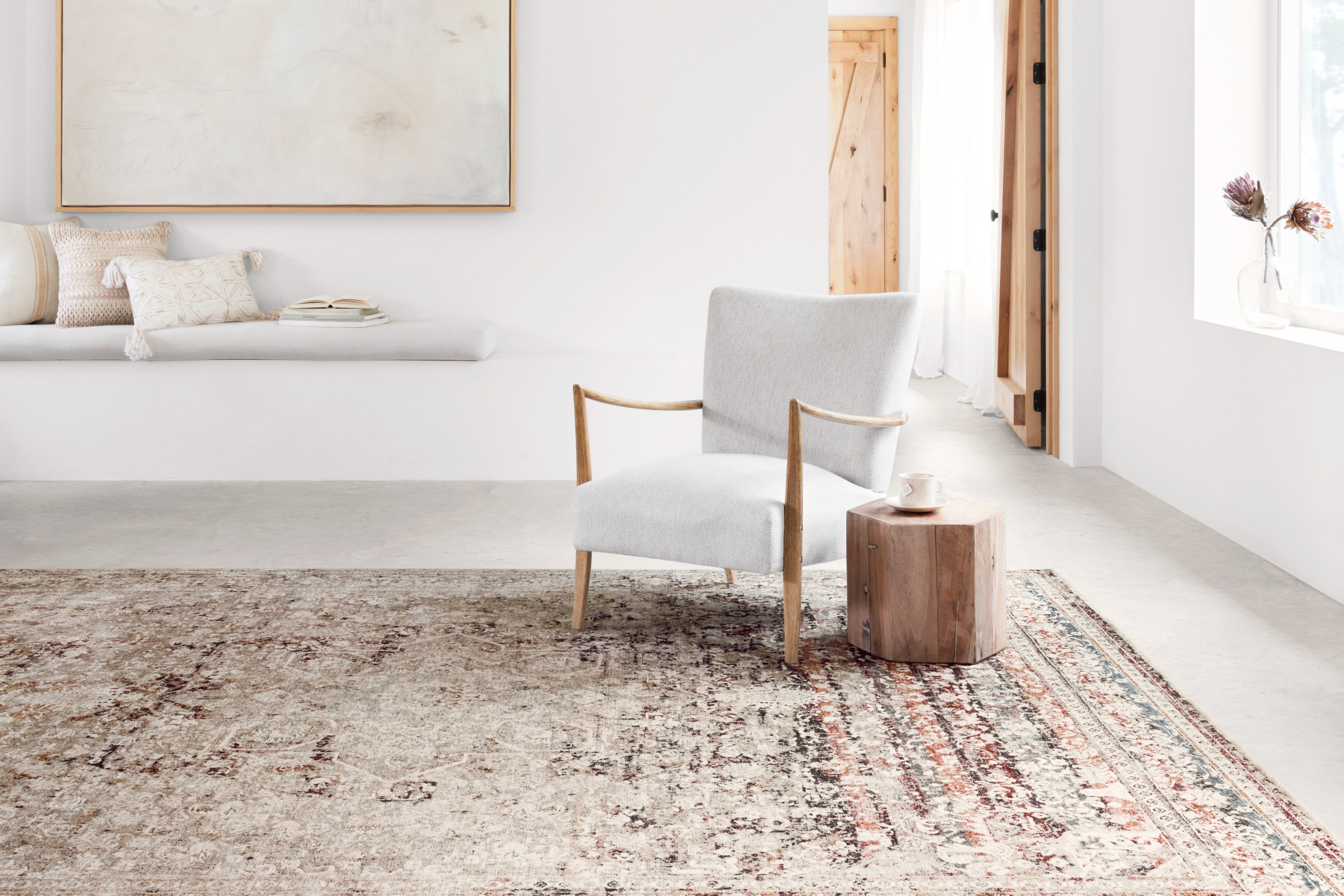 The Theia THE-05 Taupe / Brick Area Rug showcases versatile taupe and rich brick tones in a power-loomed polyester pile and rayon area rug