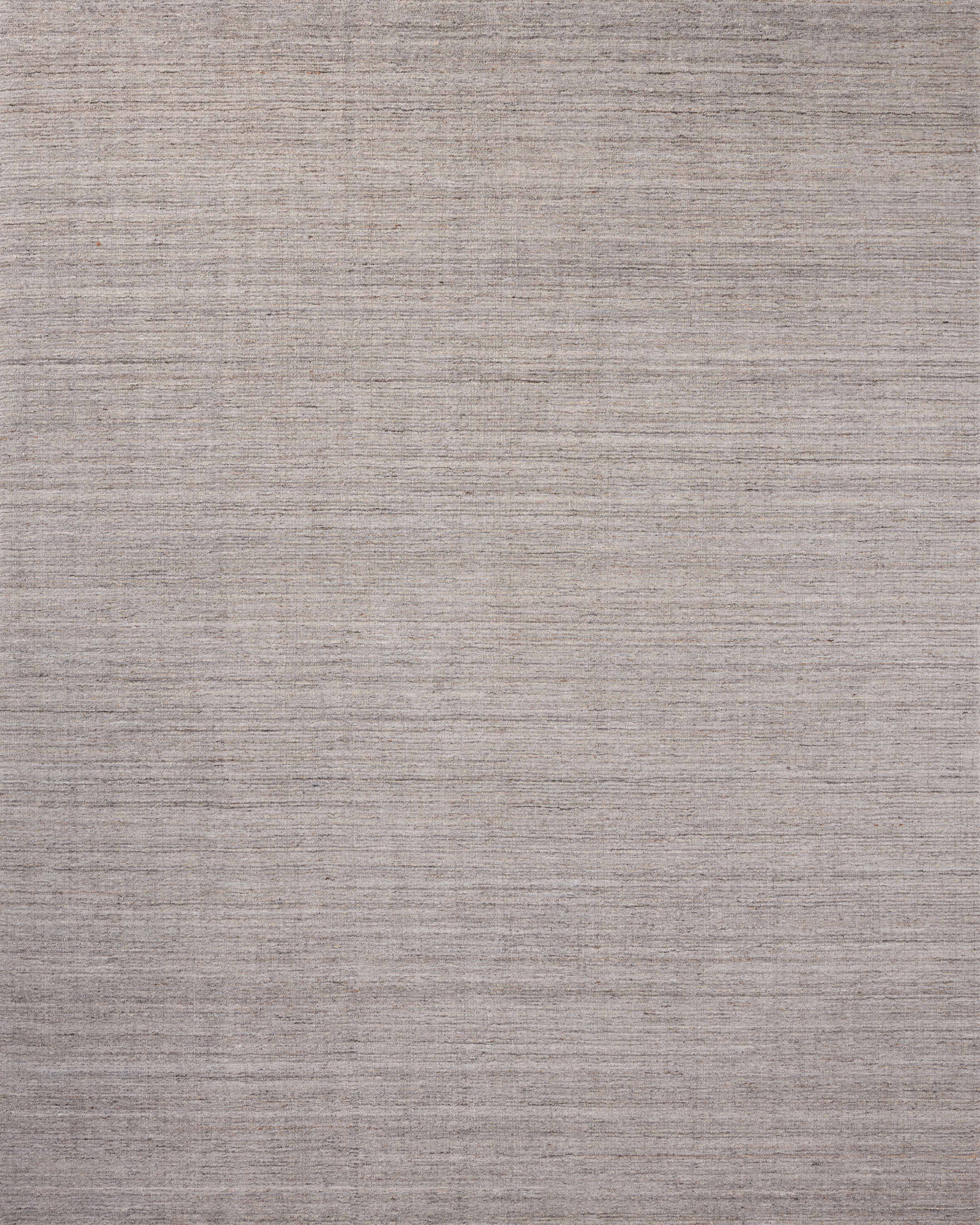 The Thorne THT-01 Grey Area Rug delivers elegant grey beauty in a hand-loomed polyester area rug
